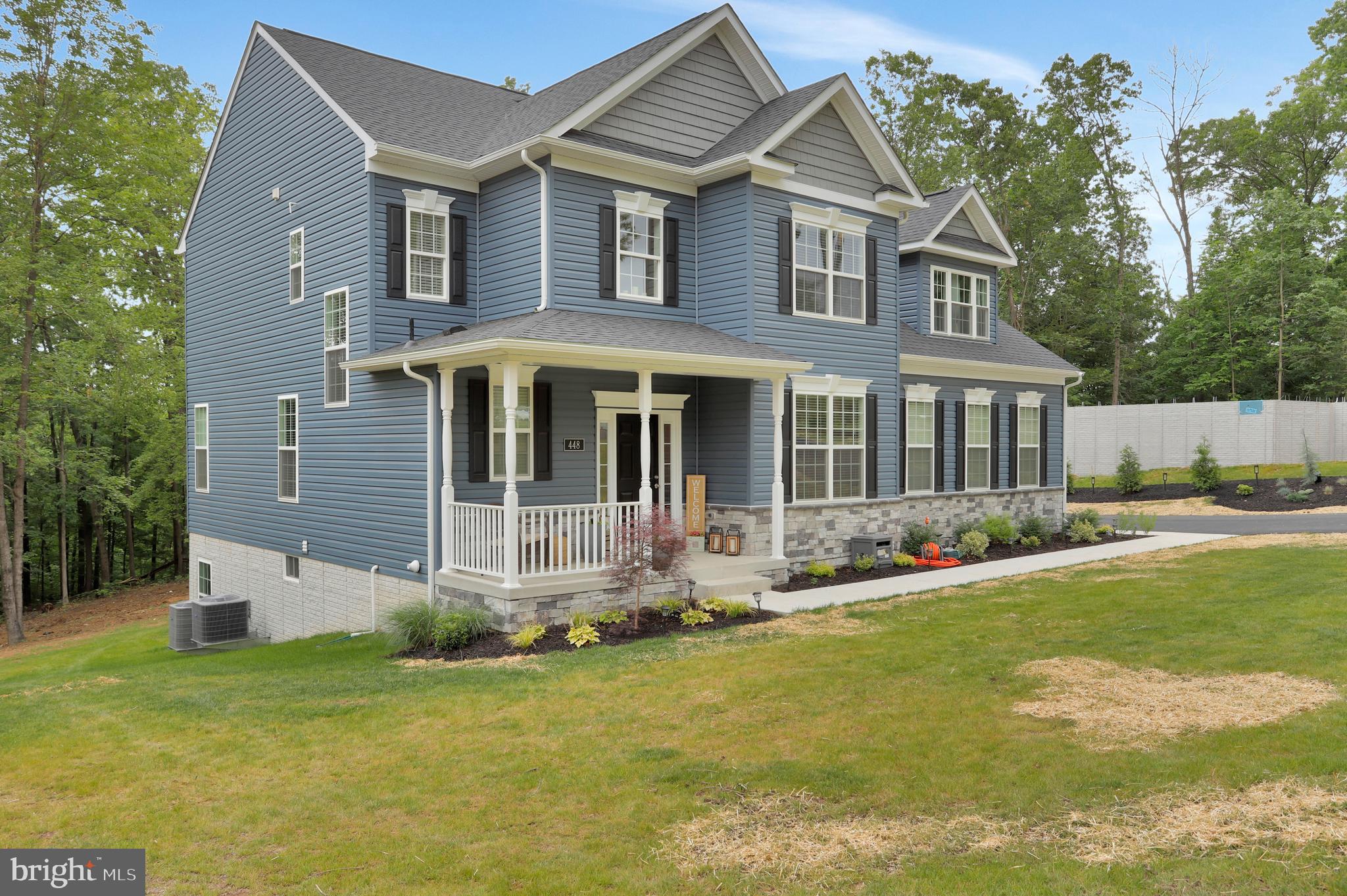 448 Underwood Drive Falling Waters, WV 25419 - Photo 47 of 55 Exterior Front Entry; Welcoming & Beautiful