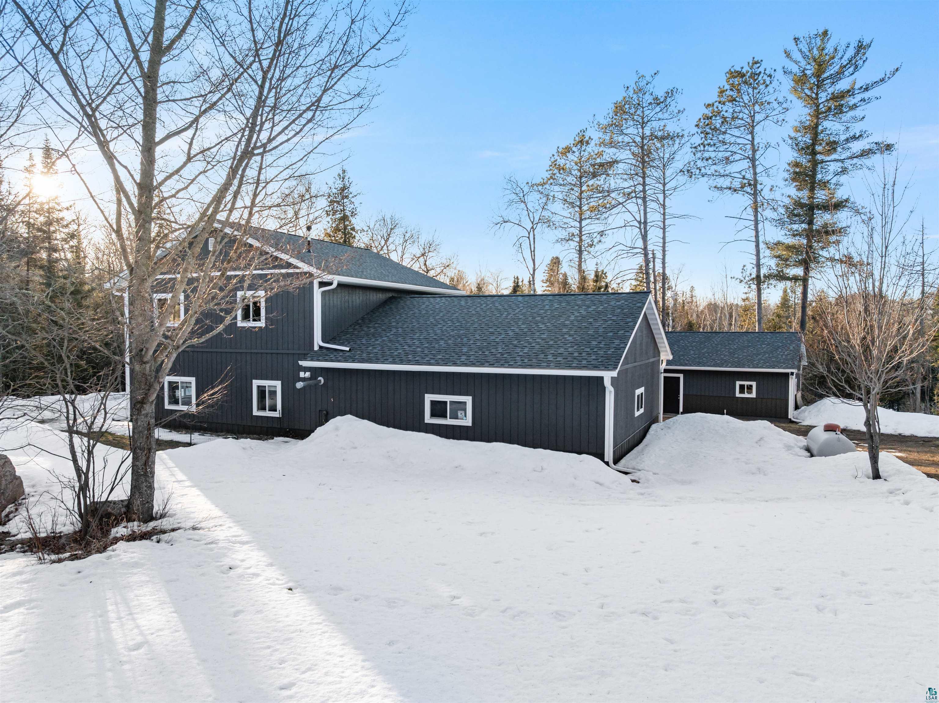 13462 Villa Road Ely, MN 55731 - Photo 30 of 68 Snow covered property with a shingled roof