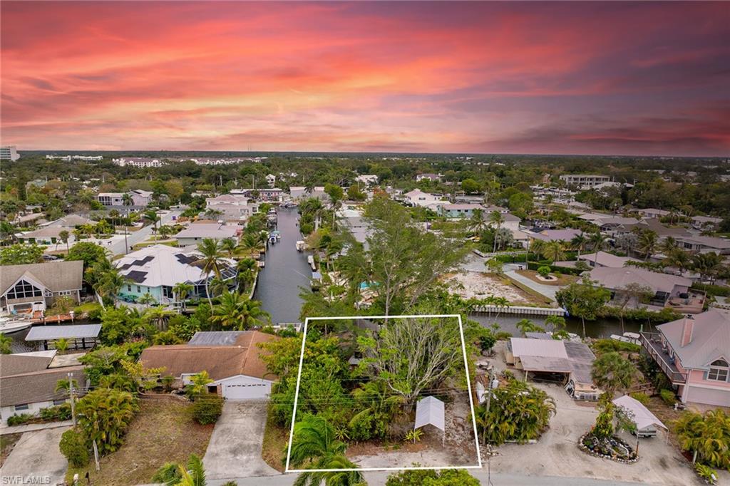 3261 Lakeview Drive Naples, FL 34112 - Photo 4 of 18 a view of a city