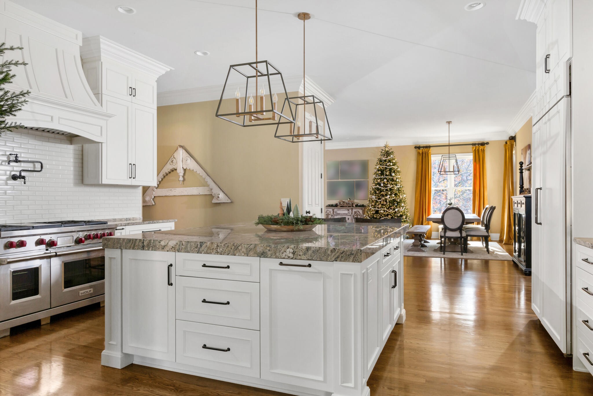 5561 Parker Branch Road Franklin, TN 37064 - Photo 4 of 21 a kitchen with granite countertop a stove and cabinets