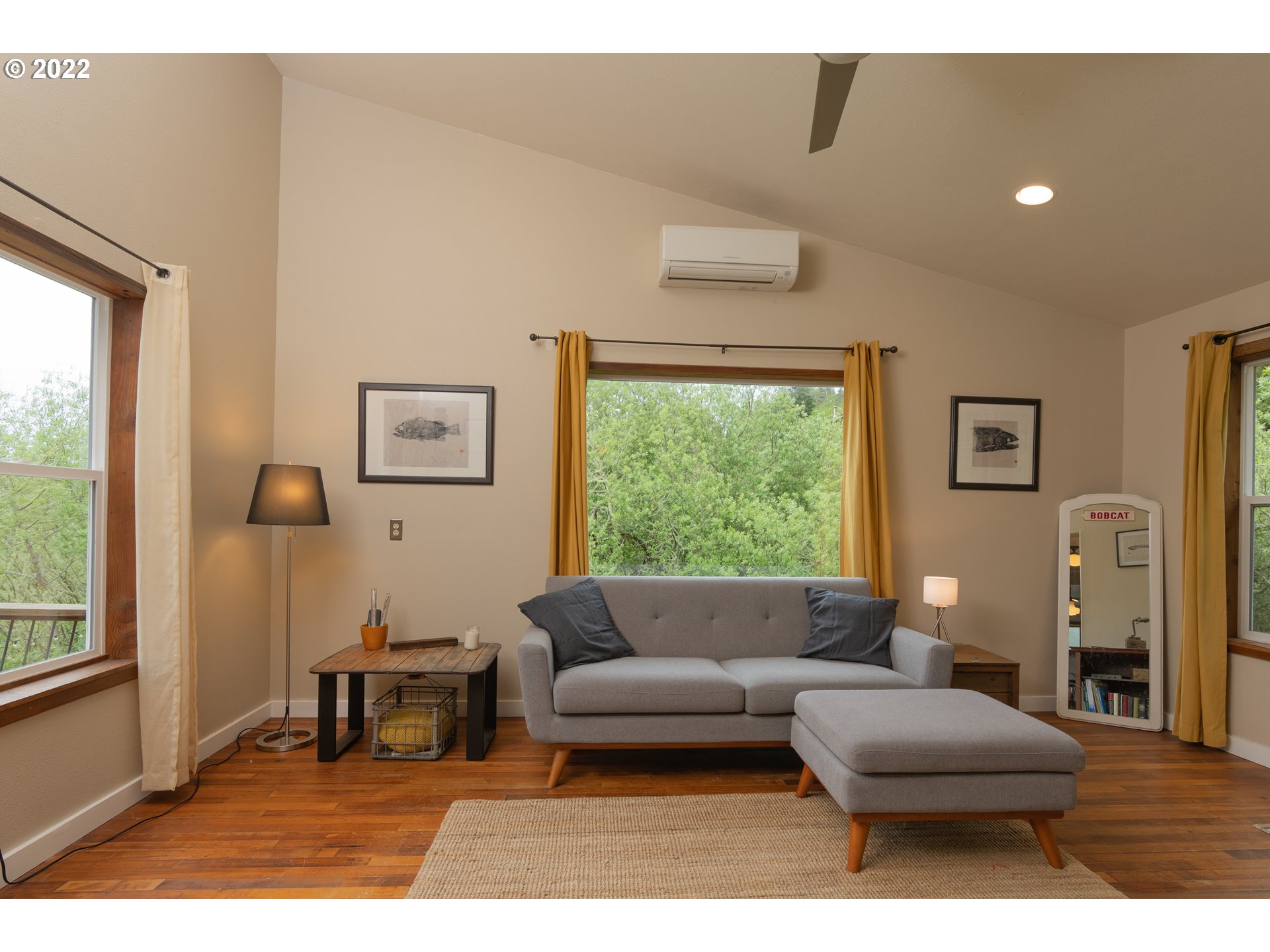89907 Youngs River Road Astoria, OR 97103 - Photo 12 of 32 a living room with furniture and a window
