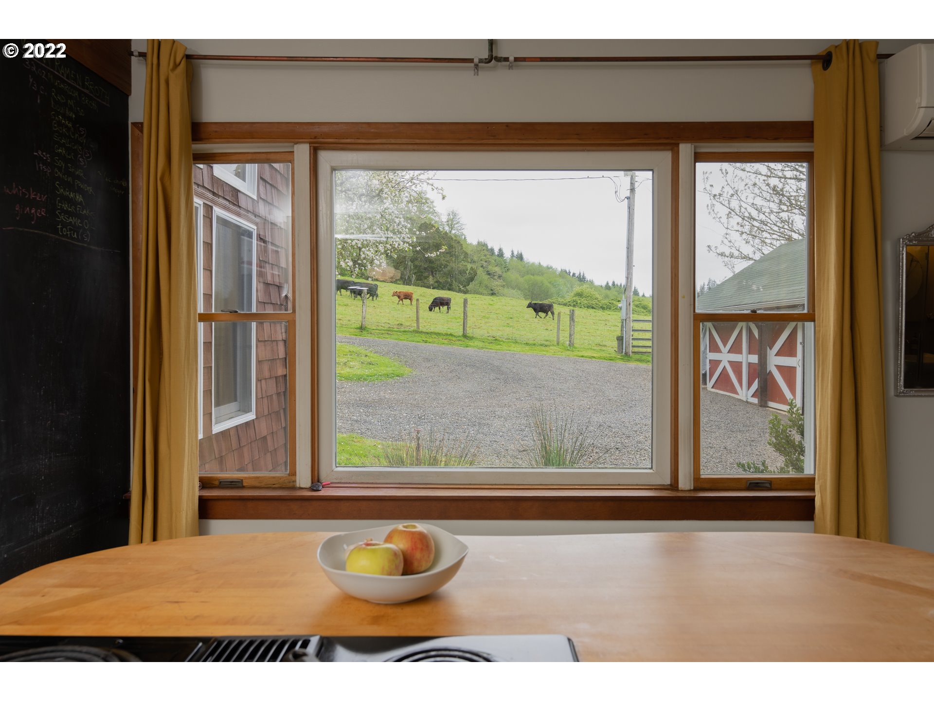 89907 Youngs River Road Astoria, OR 97103 - Photo 18 of 32 a view of a living room and a window