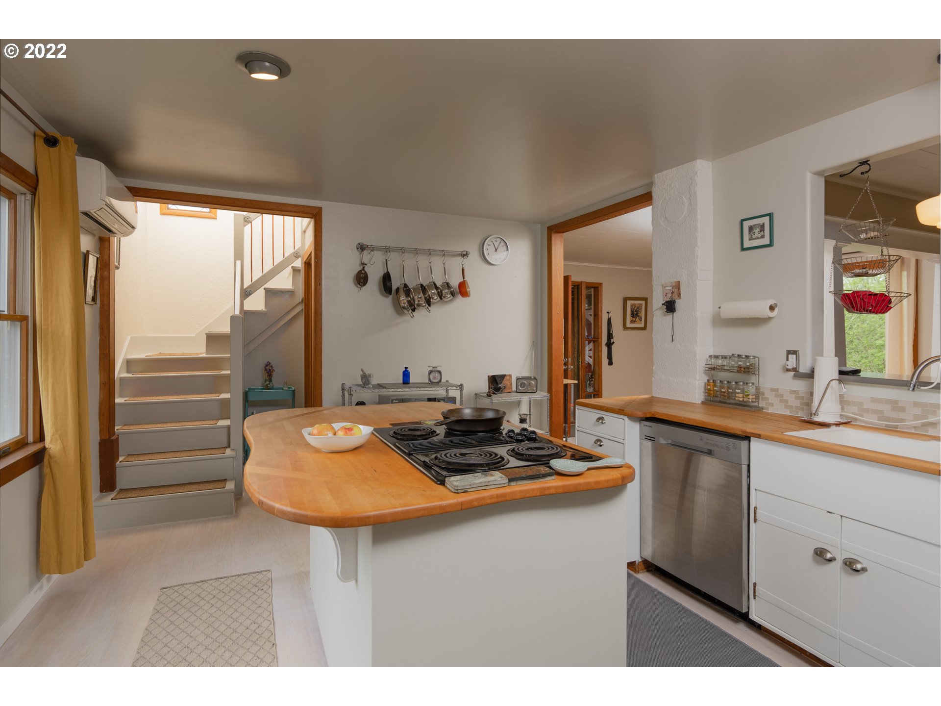 89907 Youngs River Road Astoria, OR 97103 - Photo 19 of 32 a kitchen with a sink cabinets and window