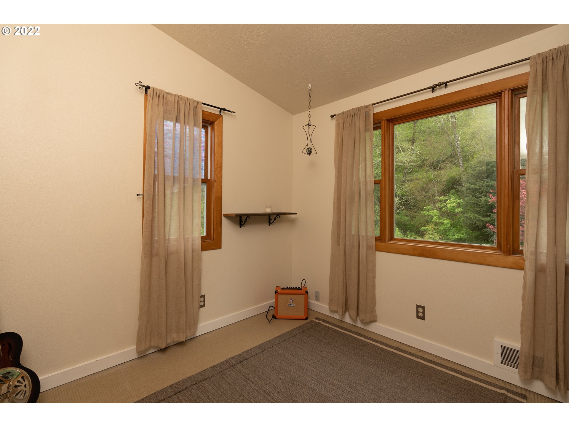89907 Youngs River Road Astoria, OR 97103 - Photo 22 of 32 a room with window and closet