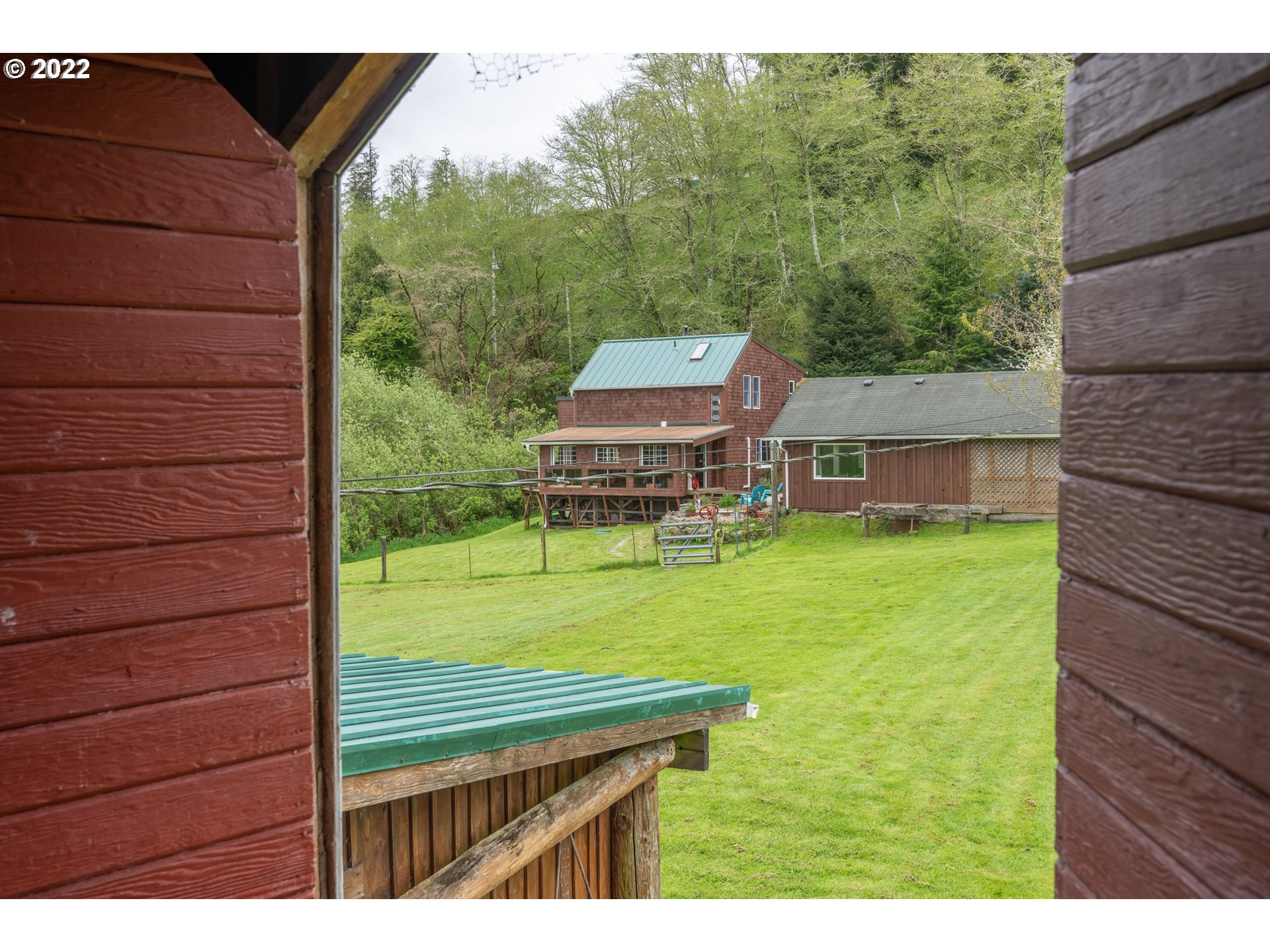89907 Youngs River Road Astoria, OR 97103 - Photo 32 of 32 a view of a house with a backyard