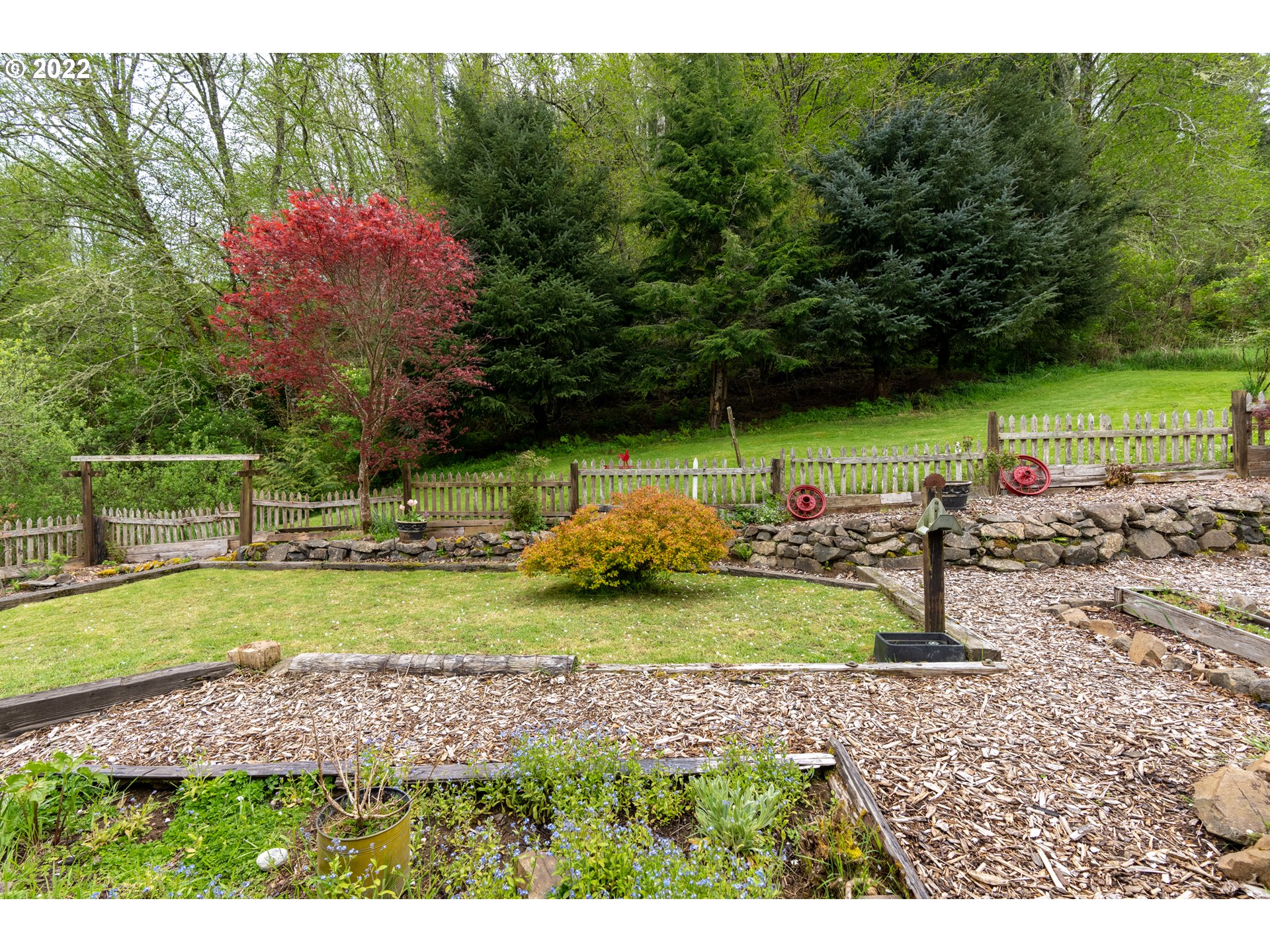 89907 Youngs River Road Astoria, OR 97103 - Photo 6 of 32 a view of a garden with an outdoor space