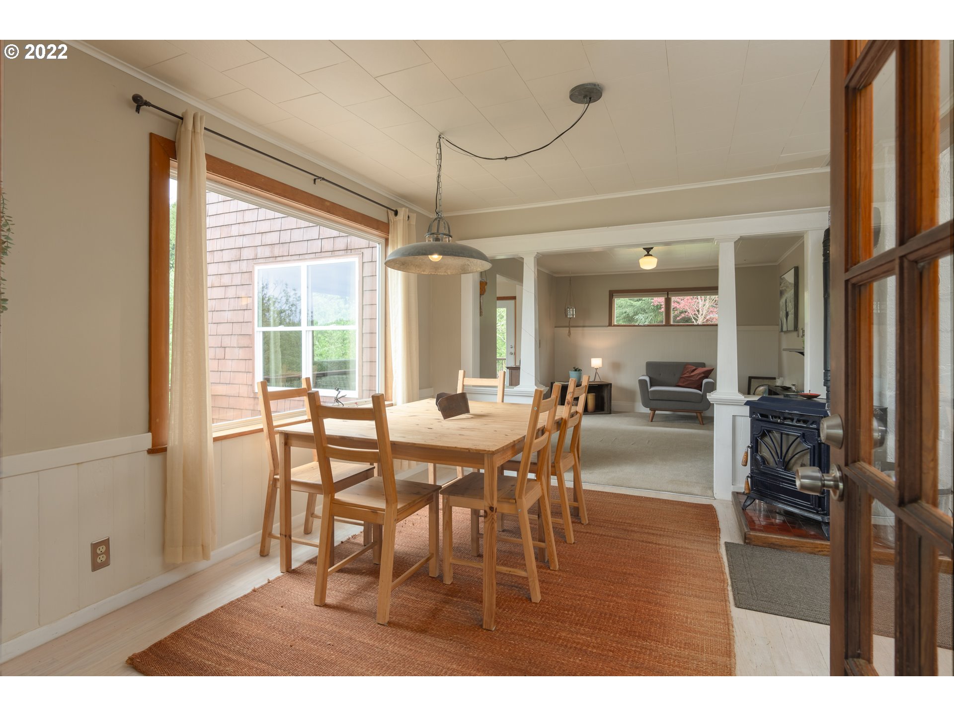 89907 Youngs River Road Astoria, OR 97103 - Photo 9 of 32 a dining room with furniture and window