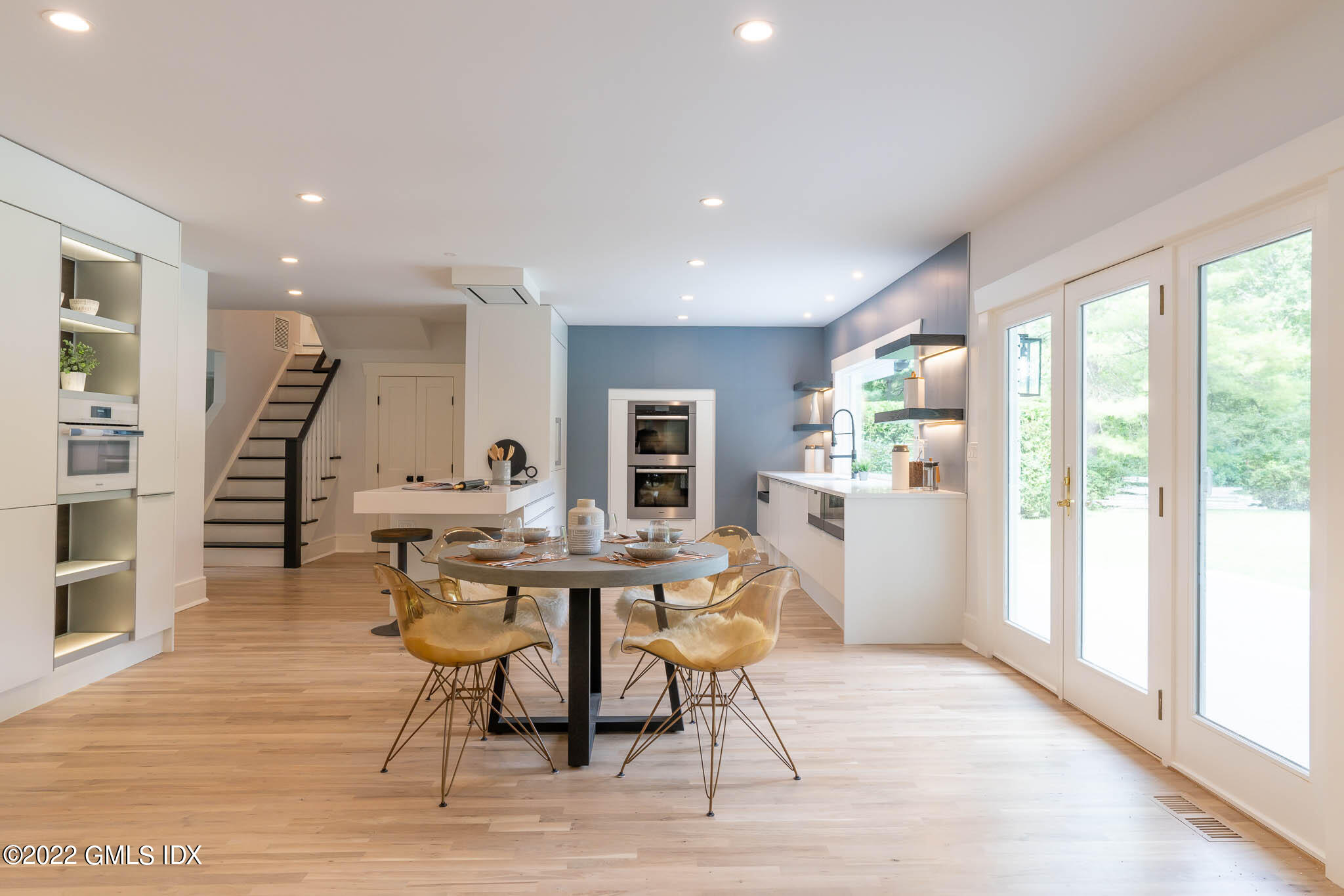 21 Hedgerow Lane Greenwich, CT 06831 - Photo 12 of 35 a view of a work space with wooden floor and furniture
