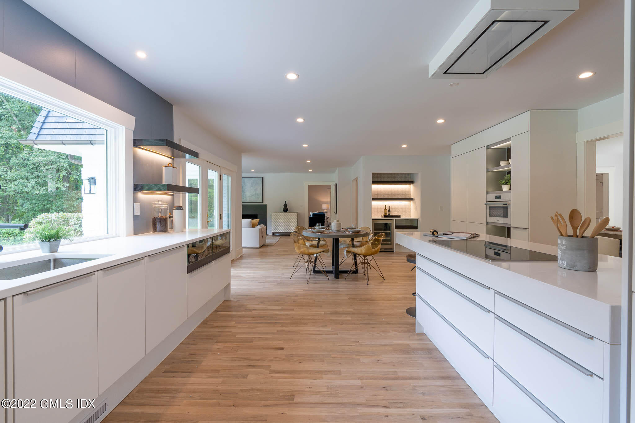 21 Hedgerow Lane Greenwich, CT 06831 - Photo 13 of 35 a large room with lots of counter space and a wooden floors