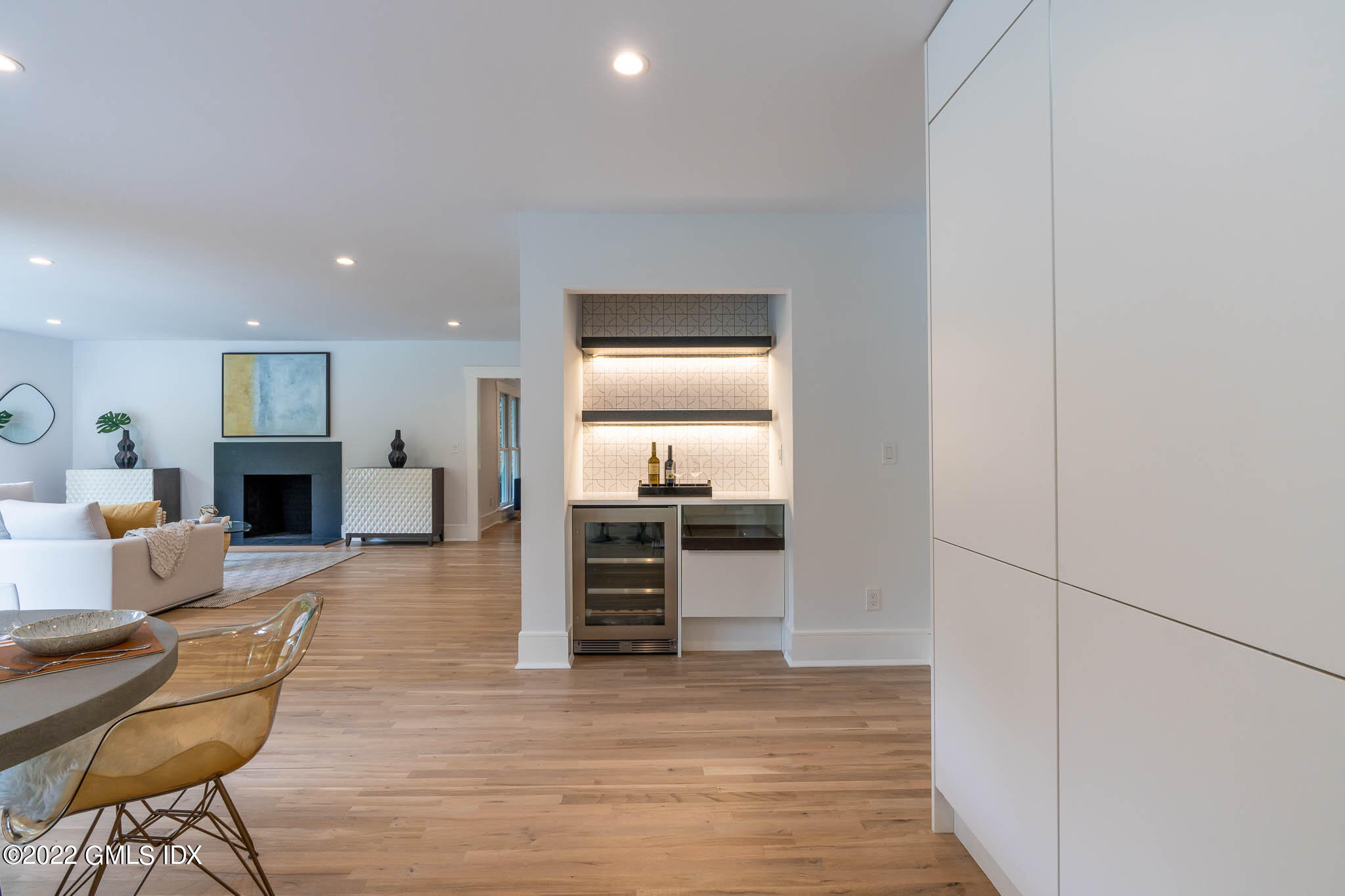 21 Hedgerow Lane Greenwich, CT 06831 - Photo 15 of 35 a living room with furniture and a wooden floor