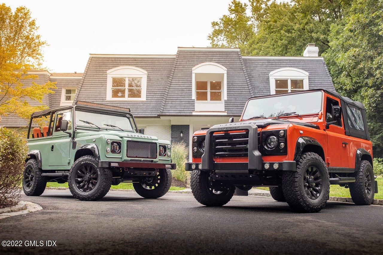 21 Hedgerow Lane Greenwich, CT 06831 - Photo 2 of 35 a car parked in front of a house