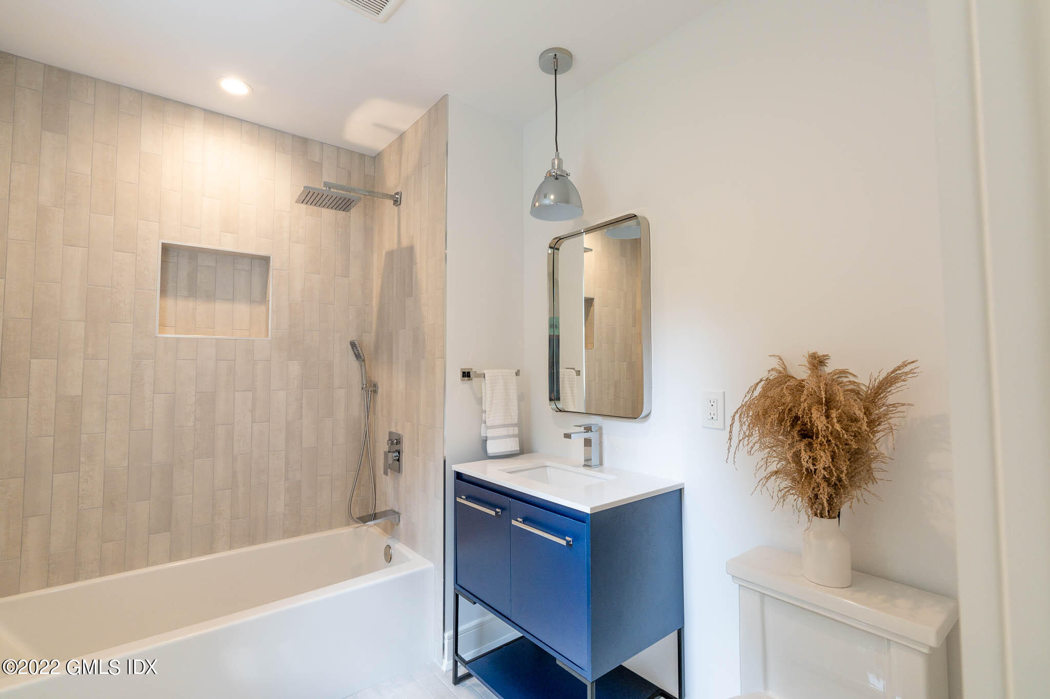 21 Hedgerow Lane Greenwich, CT 06831 - Photo 21 of 35 a bathroom with a sink a toilet and shower