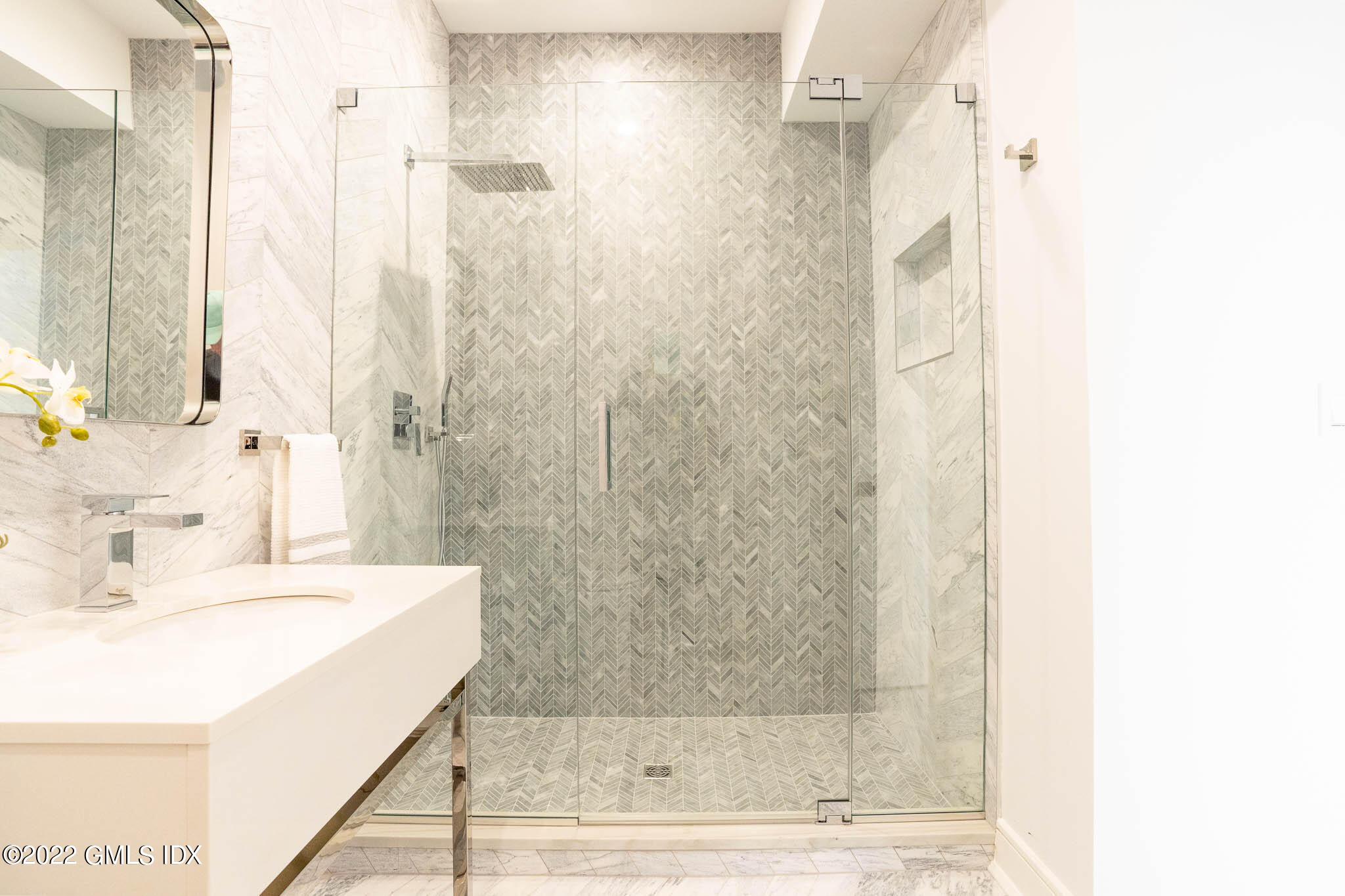 21 Hedgerow Lane Greenwich, CT 06831 - Photo 25 of 35 a bathroom with a sink and a shower