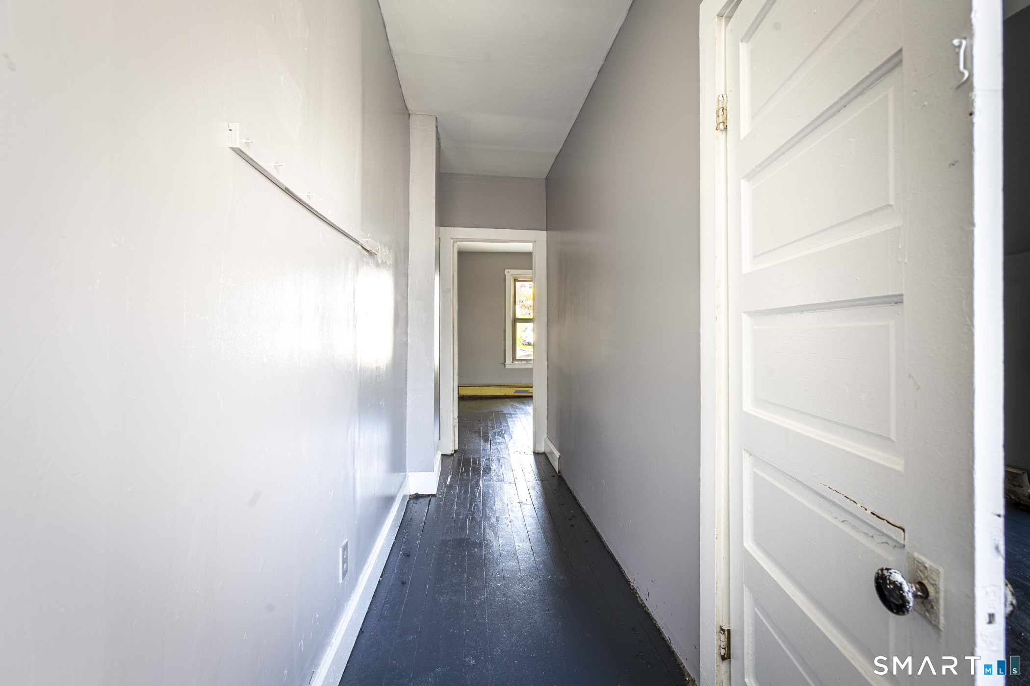 17 Hawthorne Terrace Torrington, CT 06790 - Photo 18 of 37 a view of a hallway with wooden floor and staircase