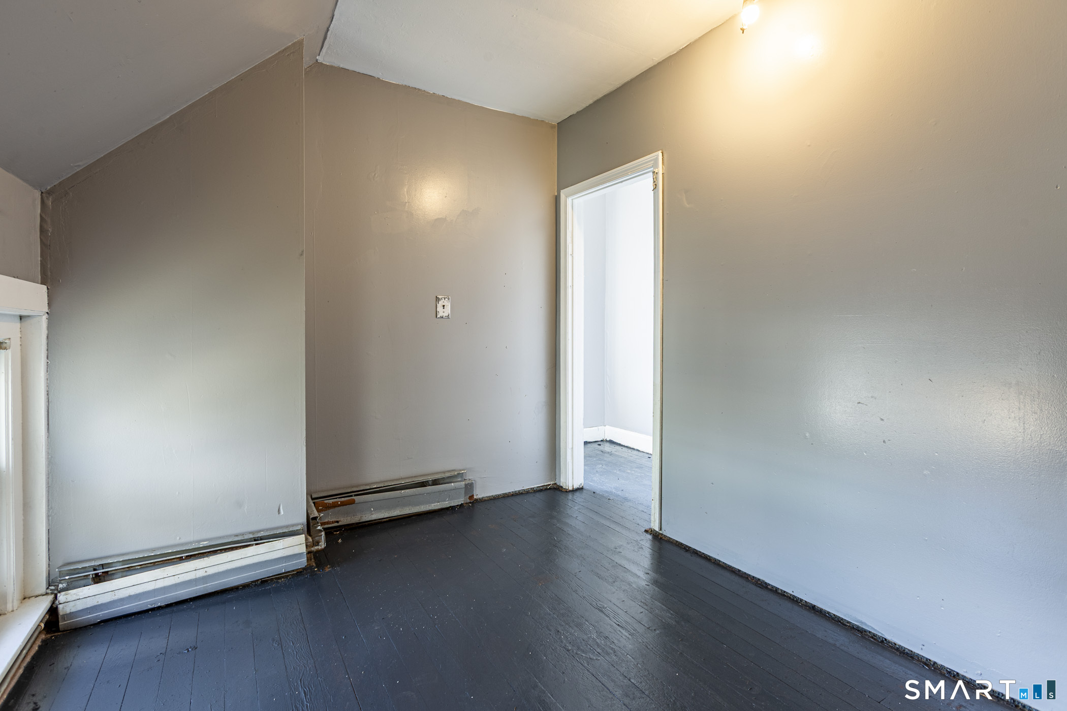 17 Hawthorne Terrace Torrington, CT 06790 - Photo 20 of 37 an empty room with wooden floor