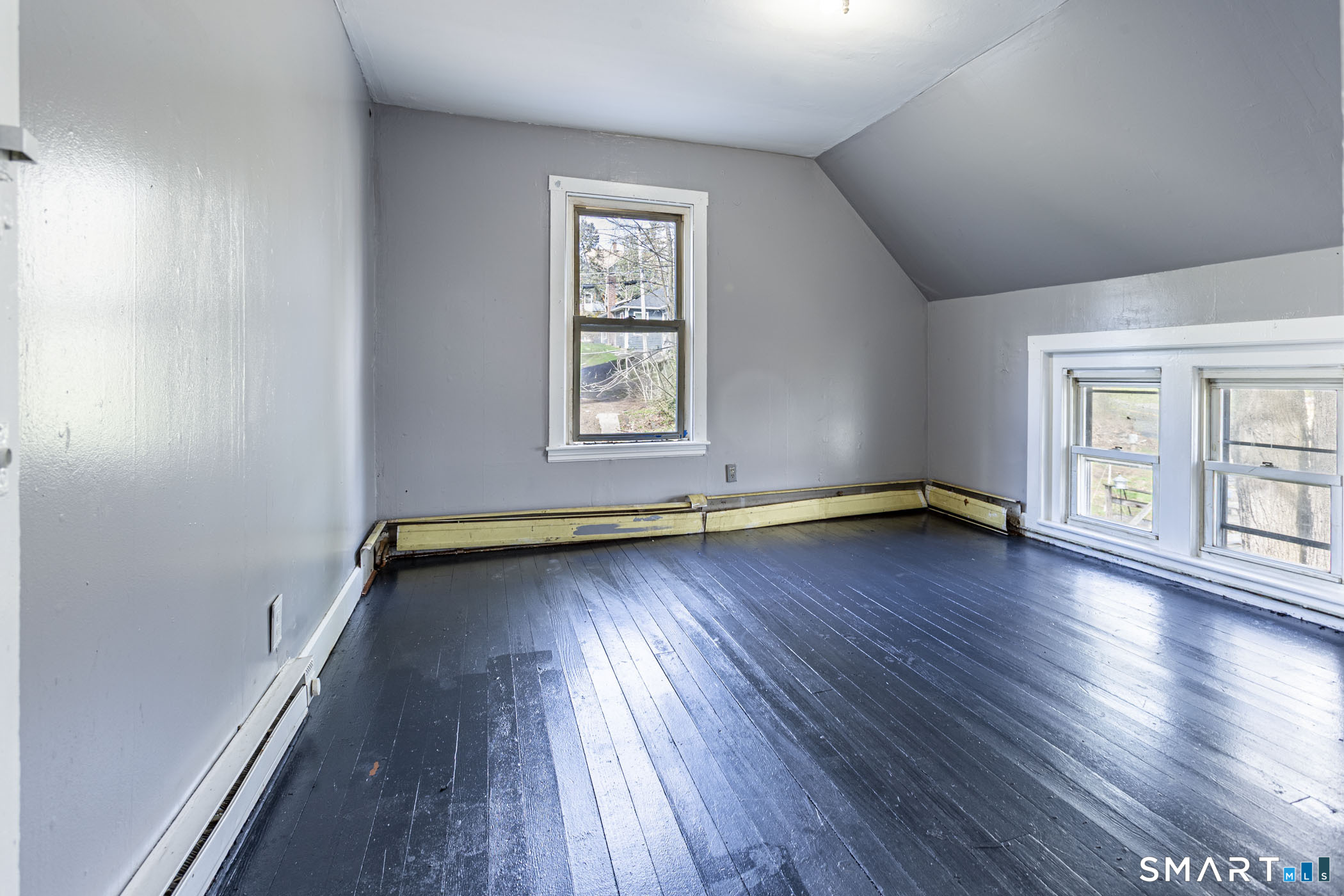 17 Hawthorne Terrace Torrington, CT 06790 - Photo 21 of 37 an empty room with wooden floor and windows