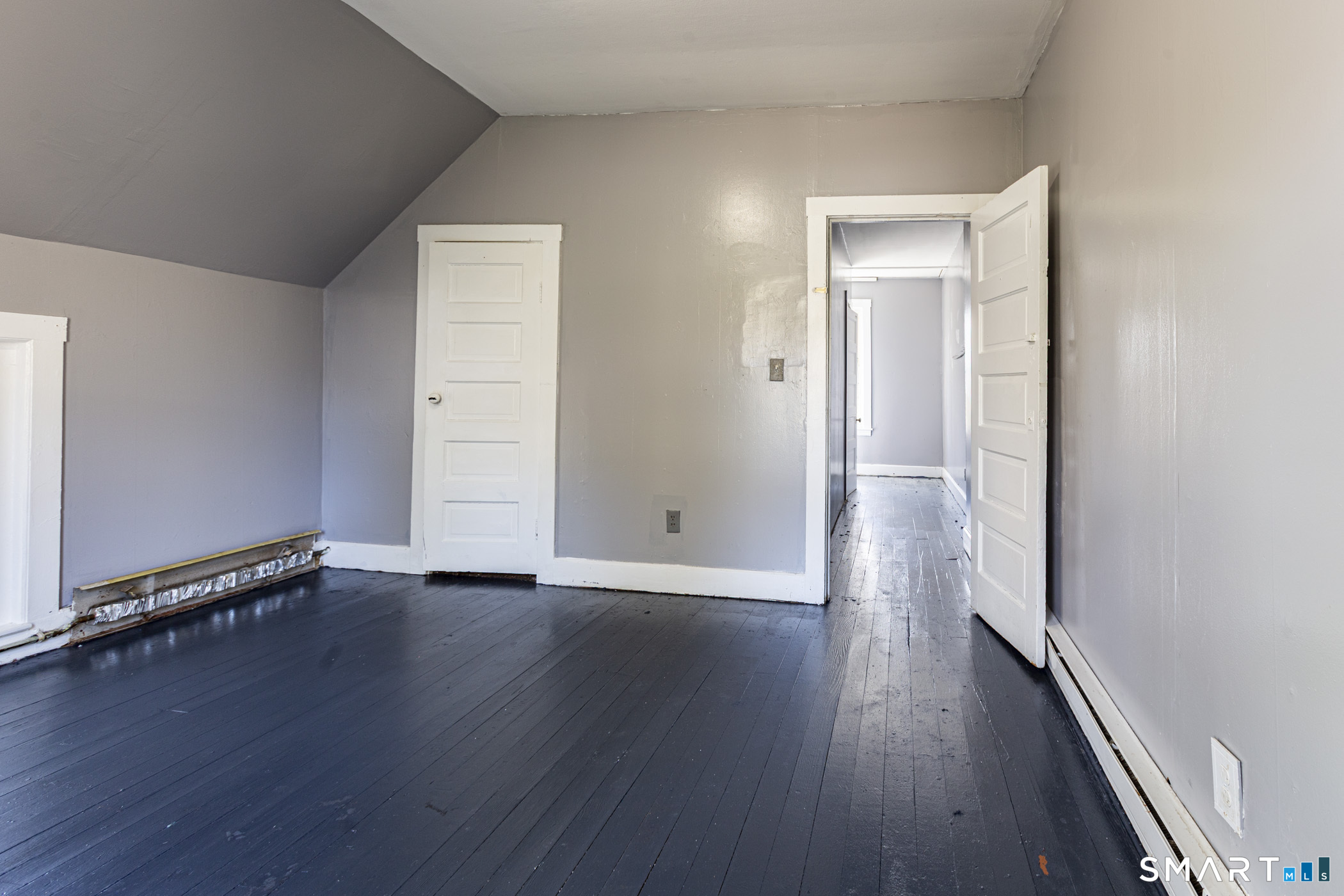 17 Hawthorne Terrace Torrington, CT 06790 - Photo 22 of 37 an empty room with wooden floor and windows