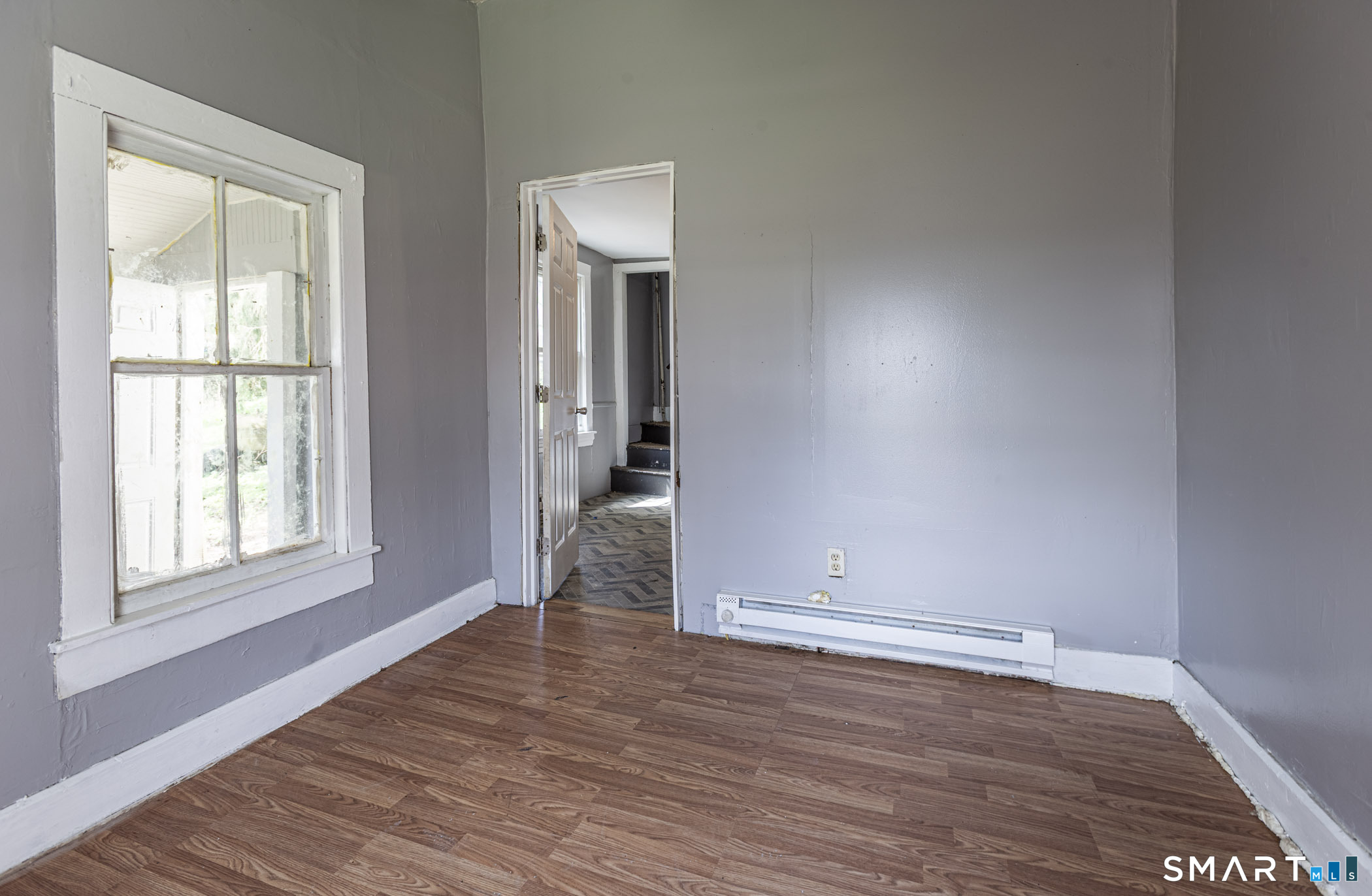 17 Hawthorne Terrace Torrington, CT 06790 - Photo 28 of 37 an empty room with wooden floor and windows