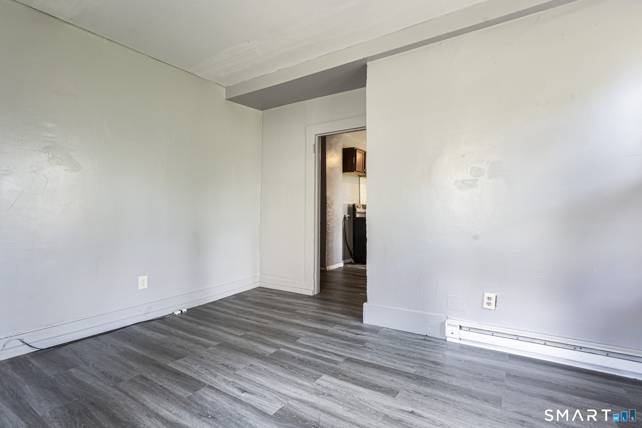 17 Hawthorne Terrace Torrington, CT 06790 - Photo 30 of 37 a view of an empty room with wooden floor