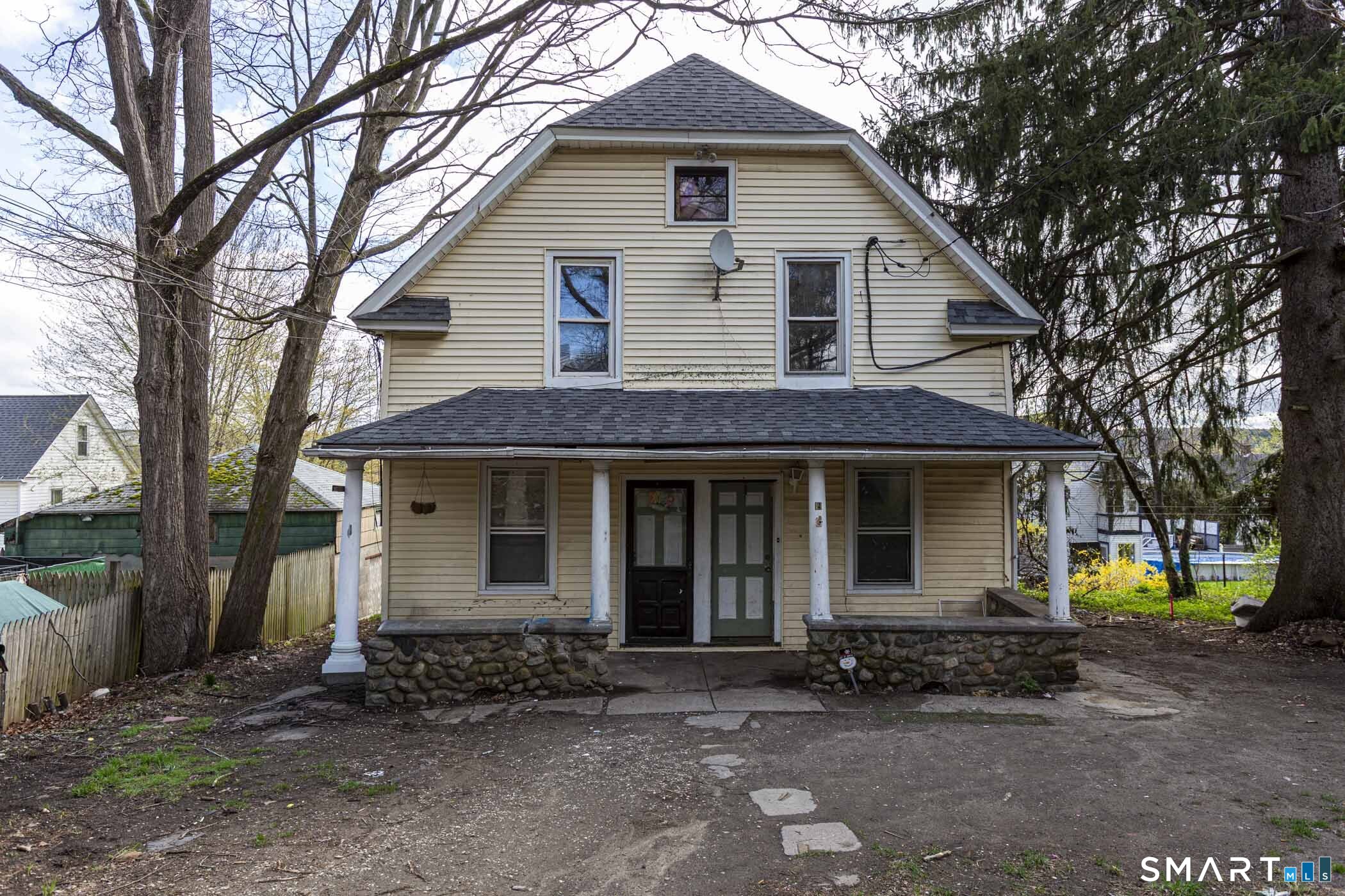 17 Hawthorne Terrace Torrington, CT 06790 - Photo 3 of 37 a front view of a house with a yard