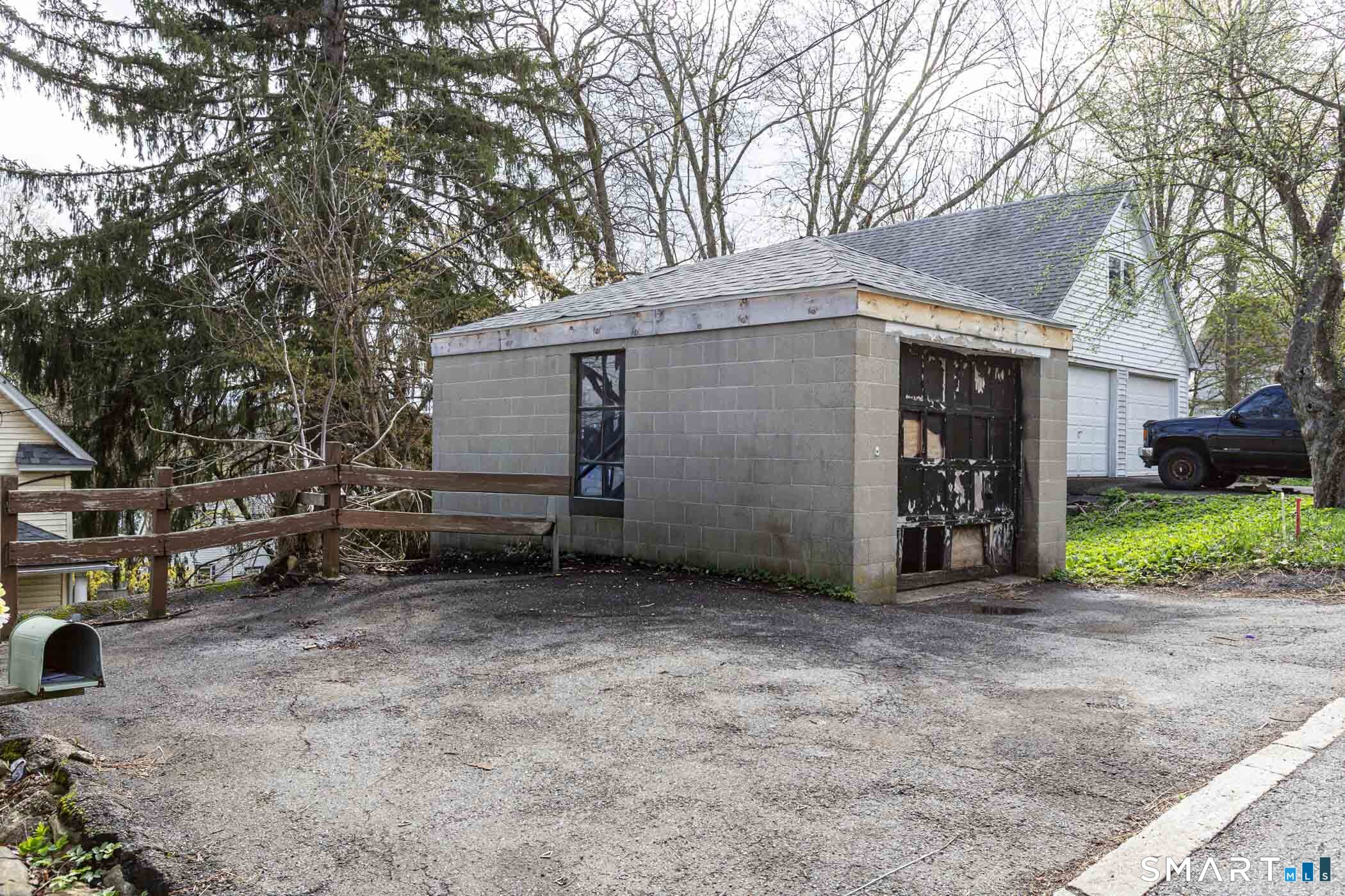 17 Hawthorne Terrace Torrington, CT 06790 - Photo 35 of 37 a view of a house with a yard and garage