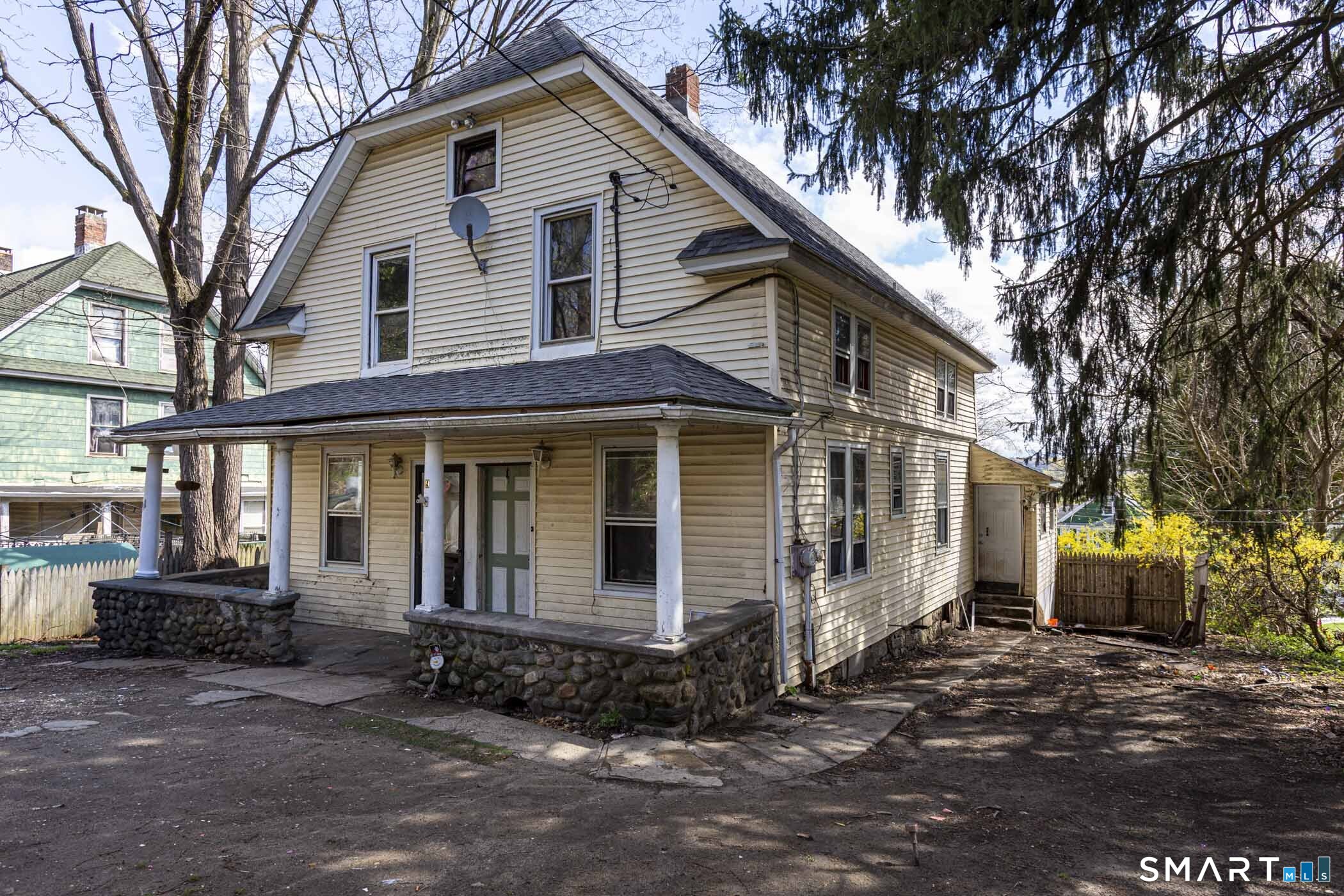 17 Hawthorne Terrace Torrington, CT 06790 - Photo 36 of 37 a front view of a house with a yard