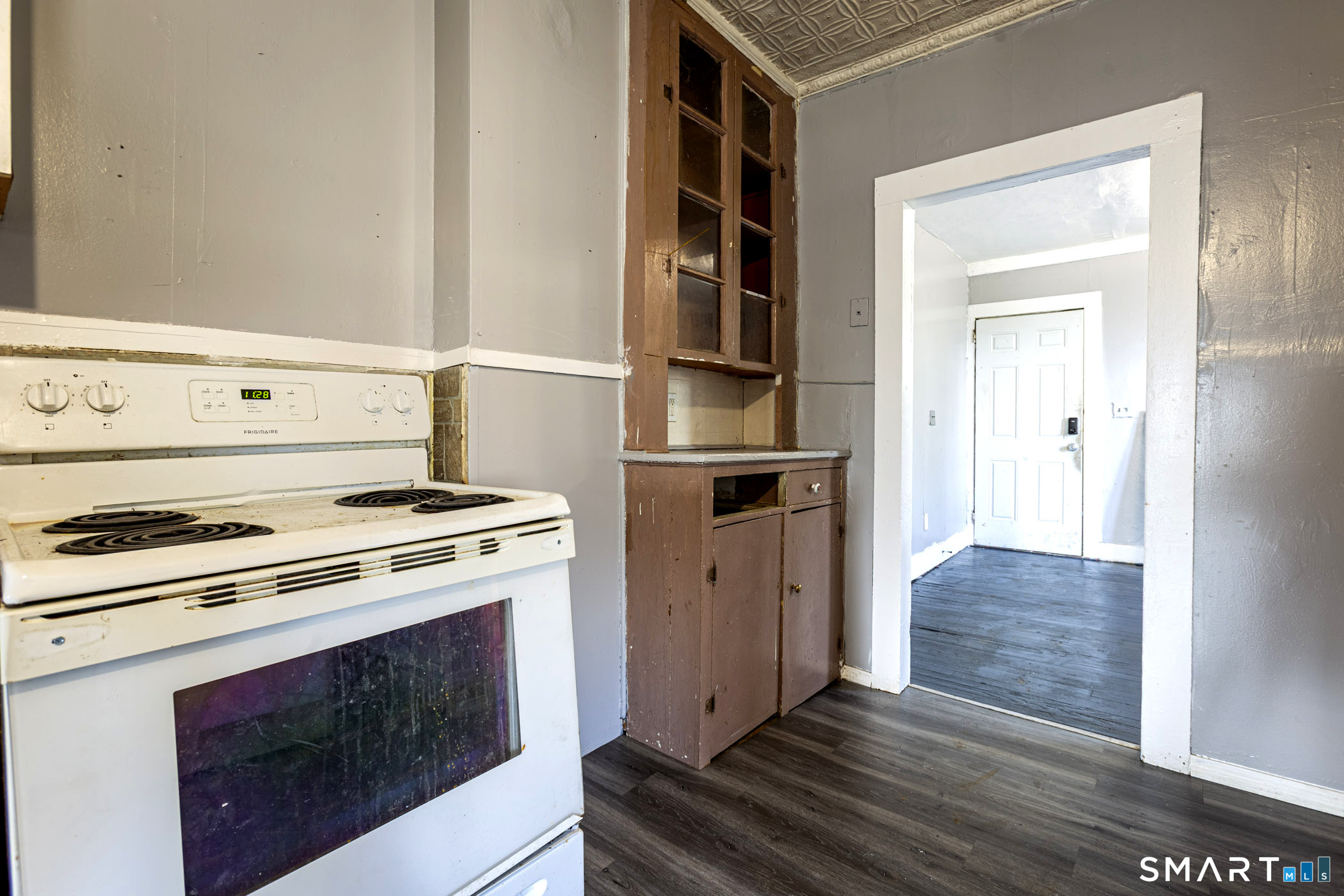 17 Hawthorne Terrace Torrington, CT 06790 - Photo 9 of 37 a kitchen with a stove and a cabinet
