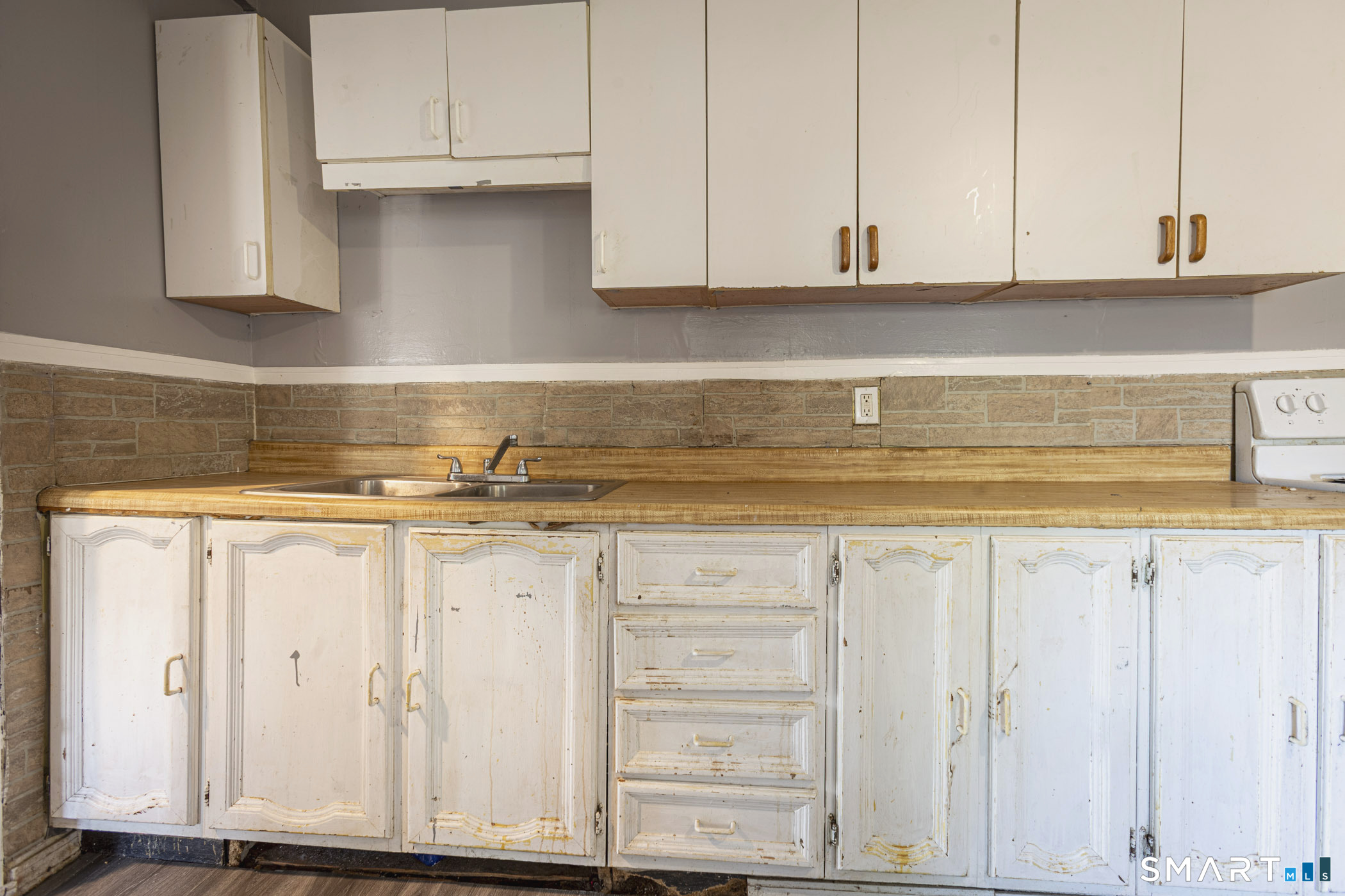 17 Hawthorne Terrace Torrington, CT 06790 - Photo 10 of 37 a view of cabinets and wooden floor