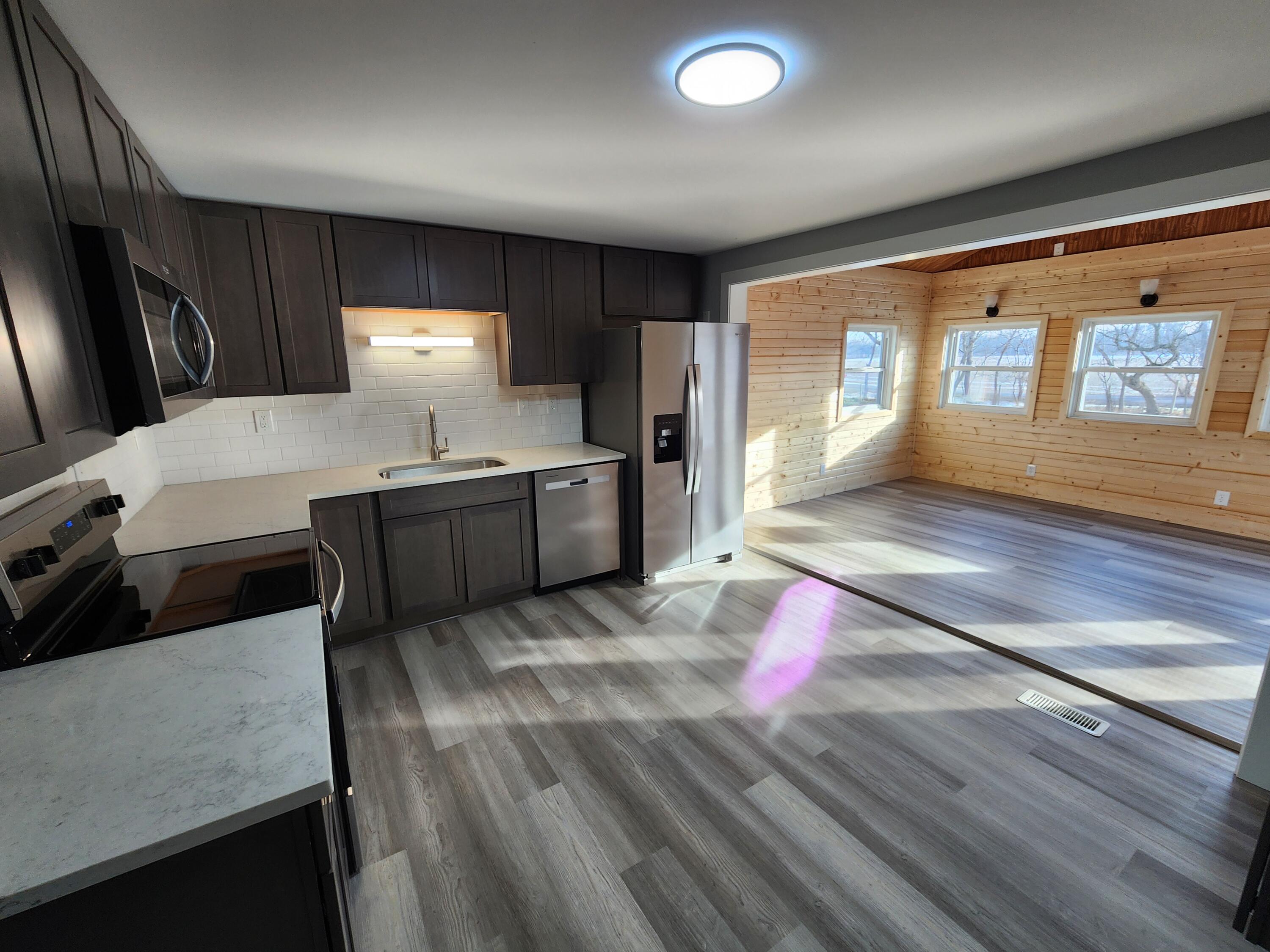 N9523 Sunset Drive Troy, WI 53120 - Photo 19 of 38 Kitchen-Sunroom