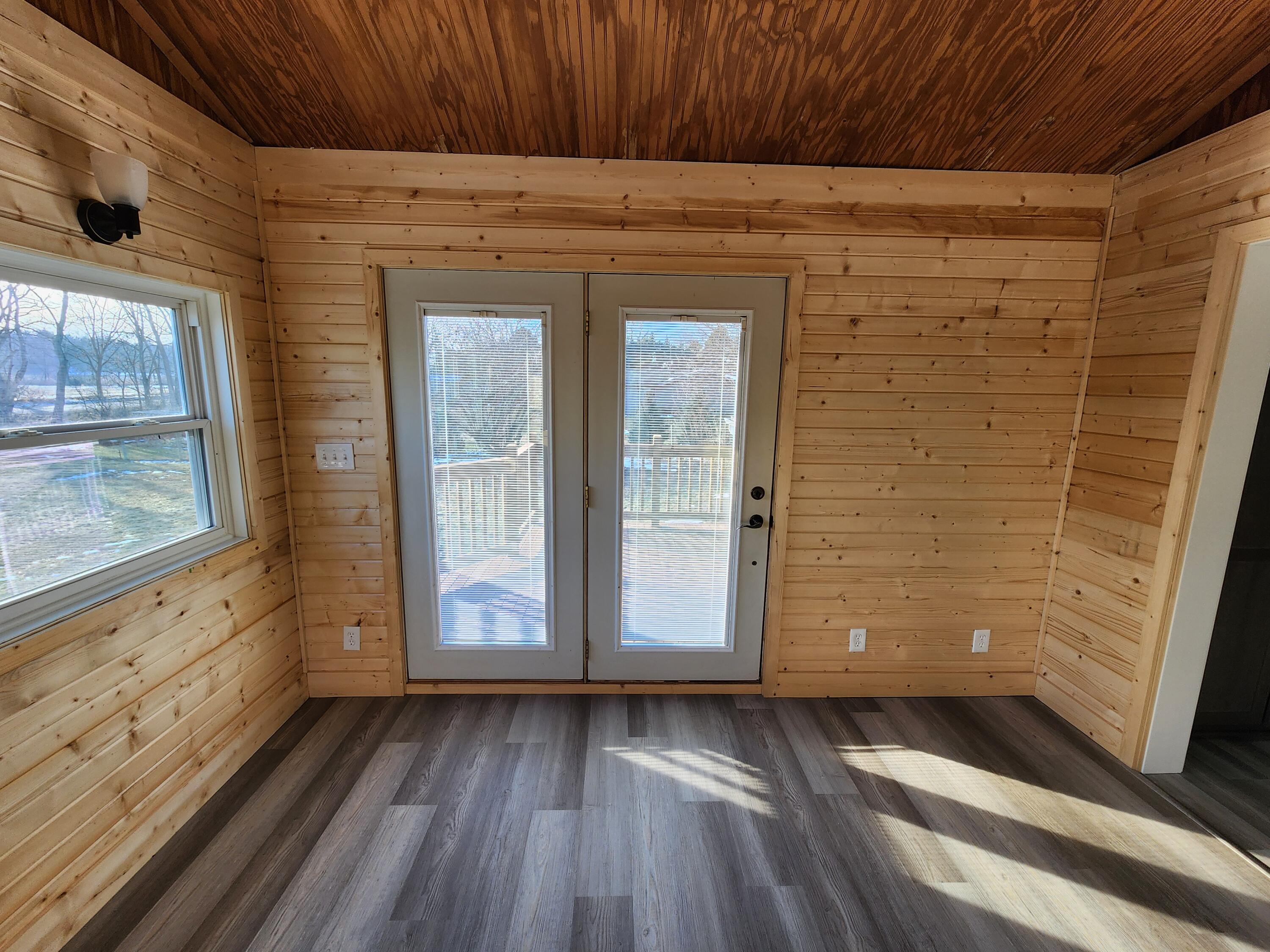 N9523 Sunset Drive Troy, WI 53120 - Photo 21 of 38 Sunroom to Deck