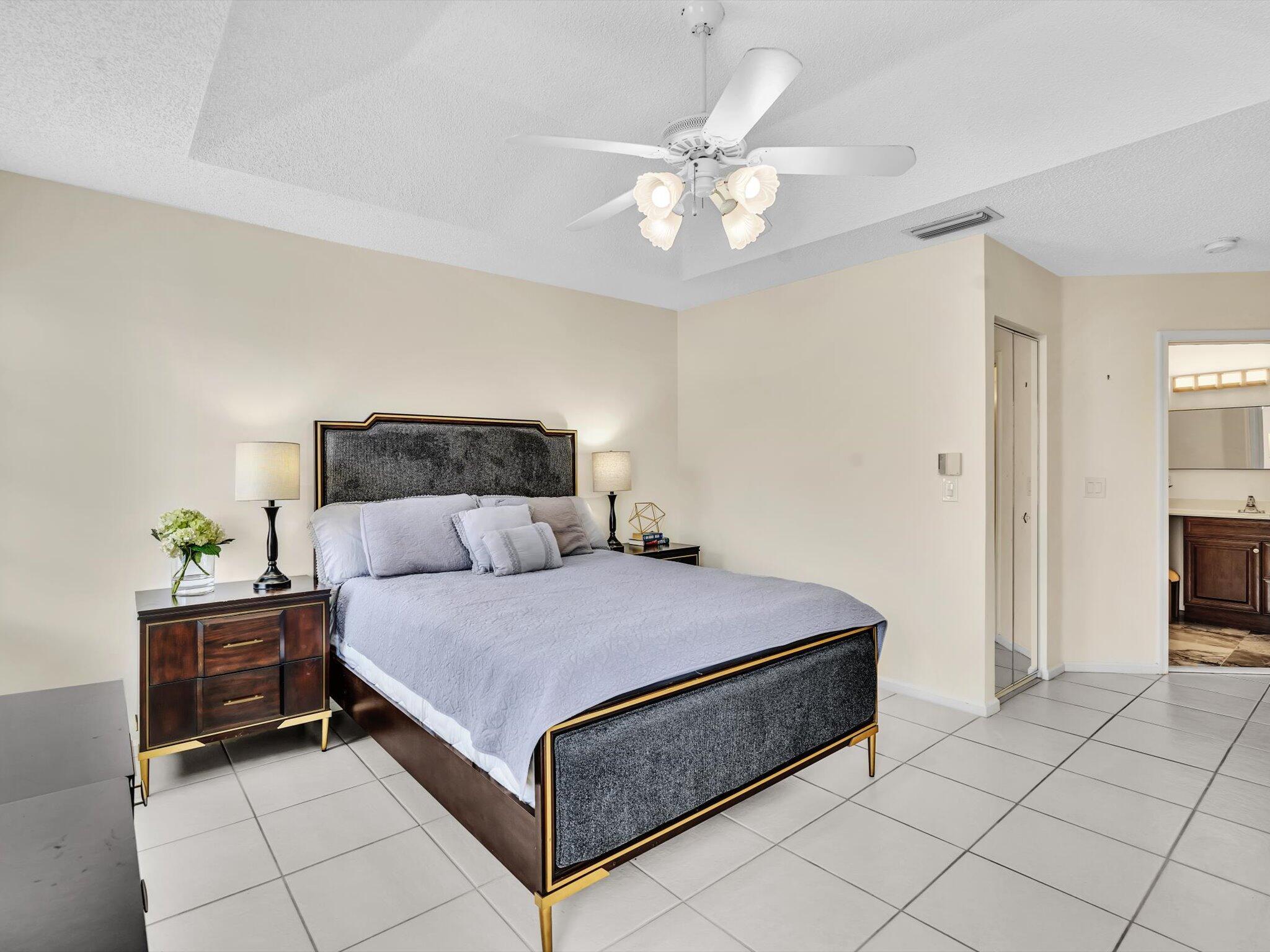 20930 Vía Azalea, Unit 5 Boca Raton, FL 33428 - Photo 19 of 37 Primary Bedroom