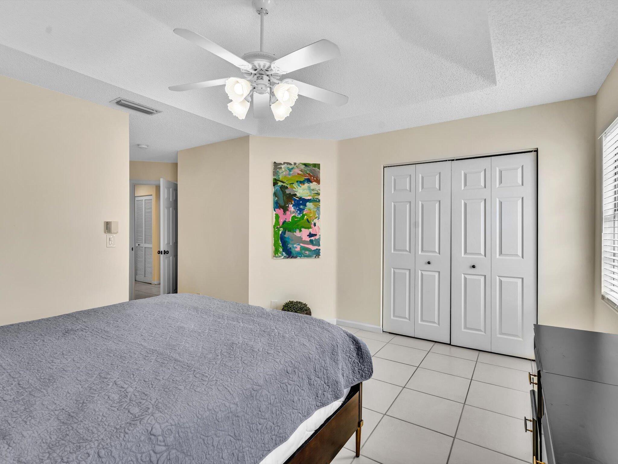 20930 Vía Azalea, Unit 5 Boca Raton, FL 33428 - Photo 20 of 37 Primary Bedroom