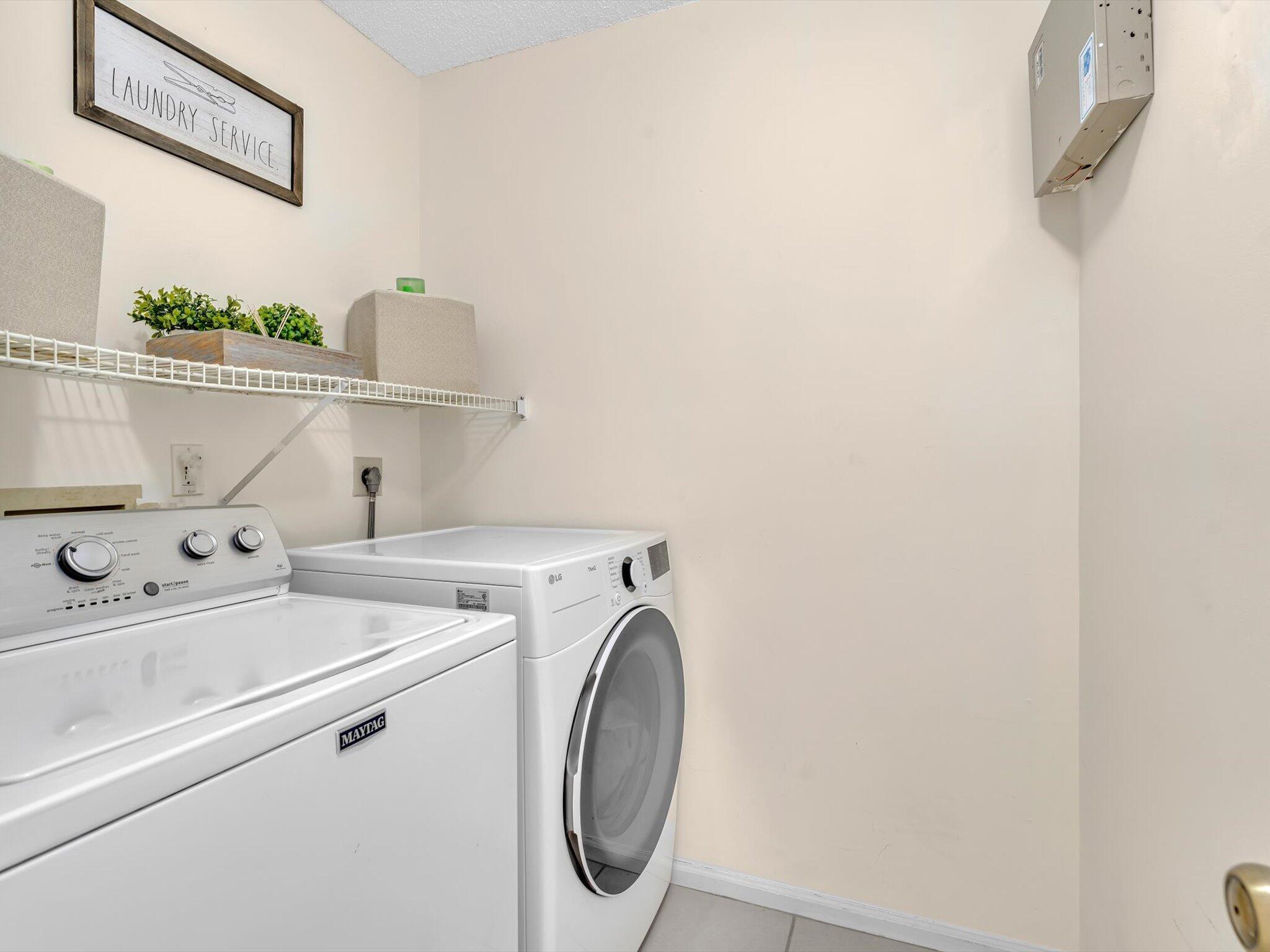 20930 Vía Azalea, Unit 5 Boca Raton, FL 33428 - Photo 28 of 37 Upstairs Laundry