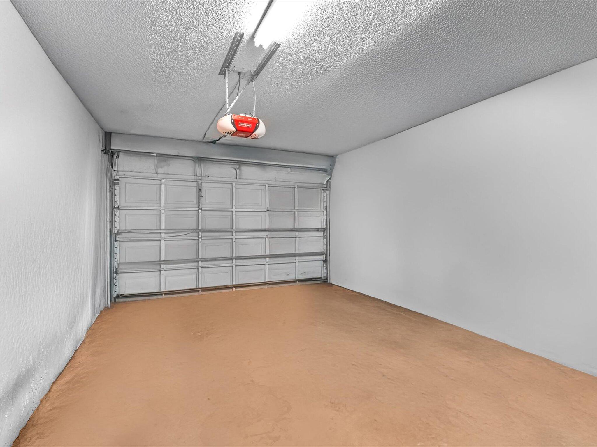 20930 Vía Azalea, Unit 5 Boca Raton, FL 33428 - Photo 31 of 37 Attached Garage