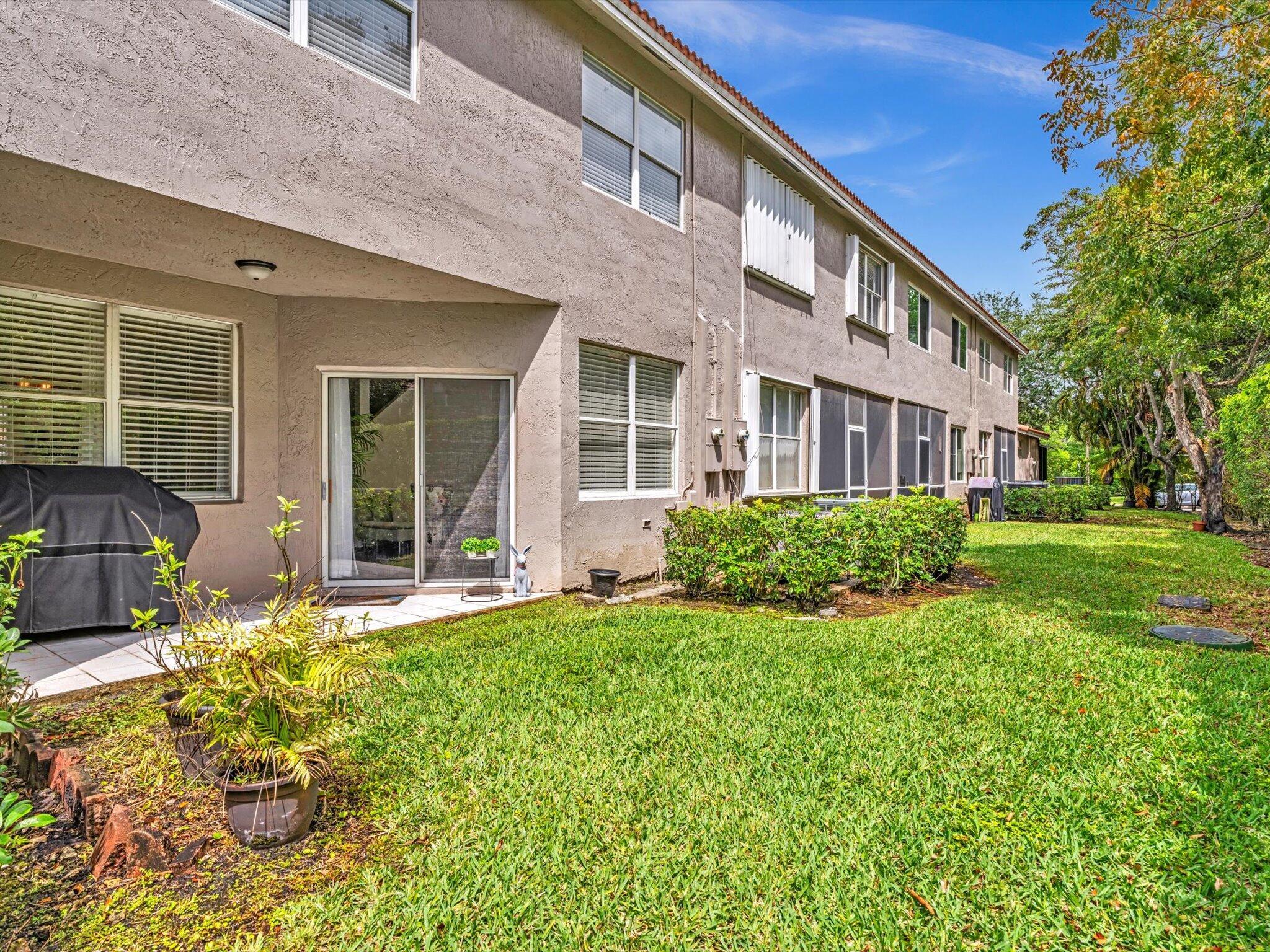 20930 Vía Azalea, Unit 5 Boca Raton, FL 33428 - Photo 34 of 37 Back Patio