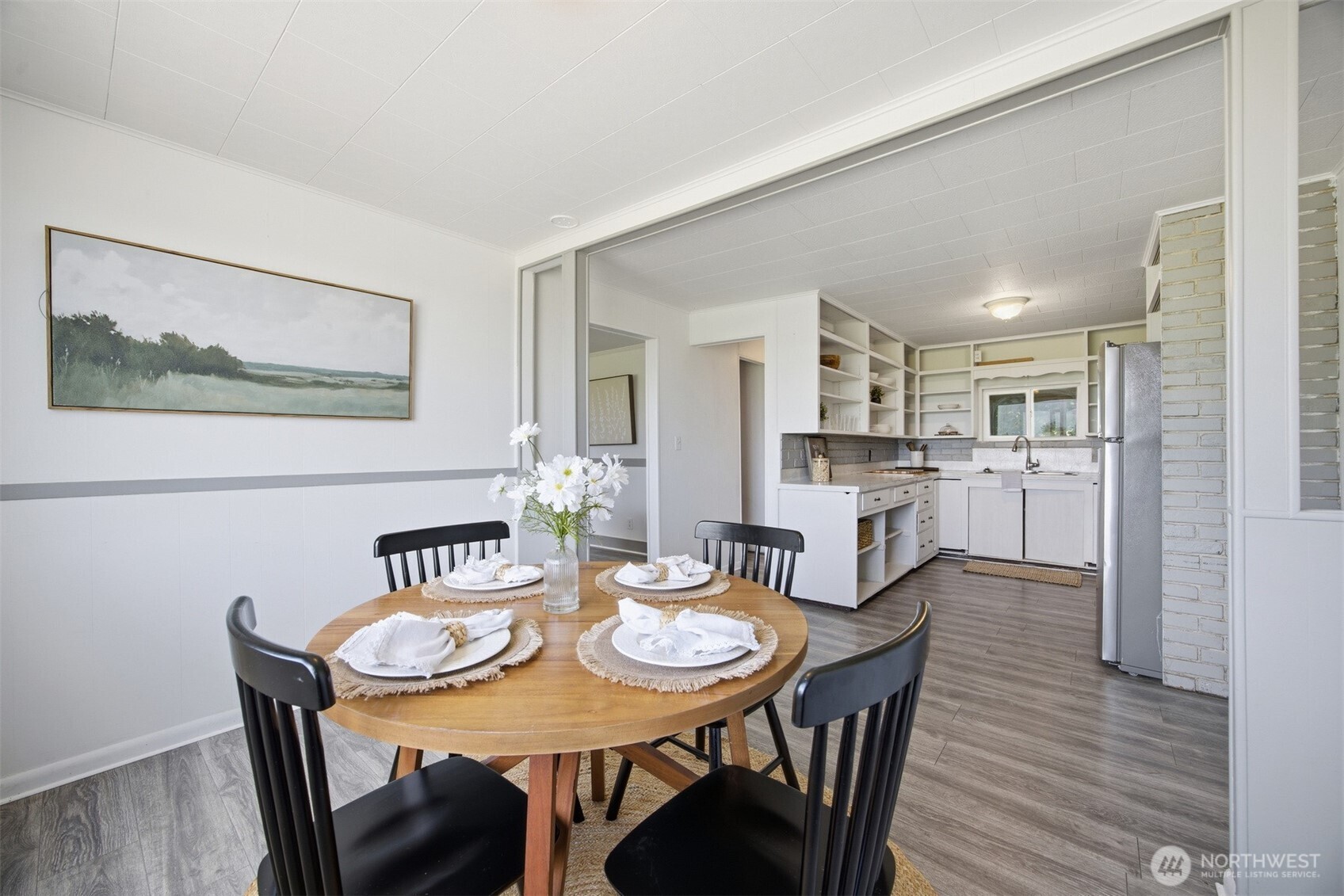 6791 Noon Road Everson, WA 98247 - Photo 18 of 38 a view of a dining room with furniture and wooden floor