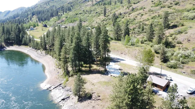 a view of swimming pool with a yard