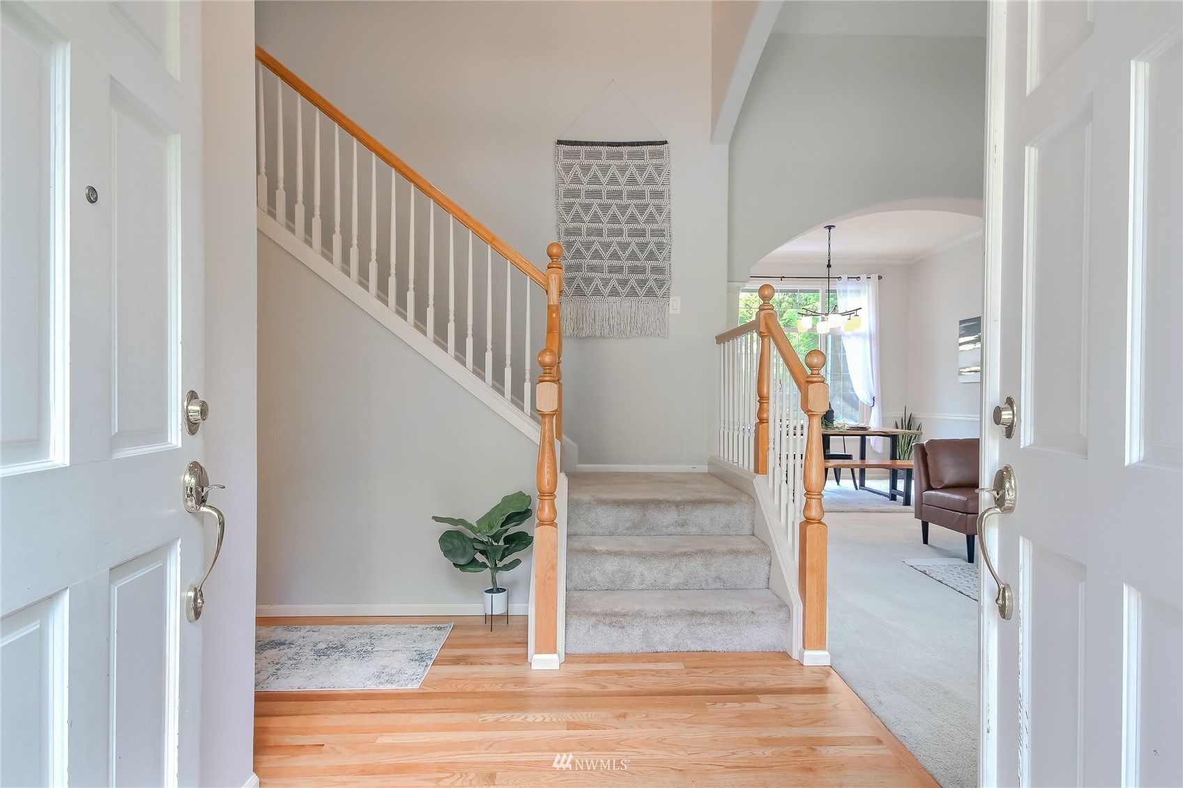 3007 204th Street Southeast Bothell, WA 98012 - Photo 15 of 37 a view of entryway and hall with wooden floor