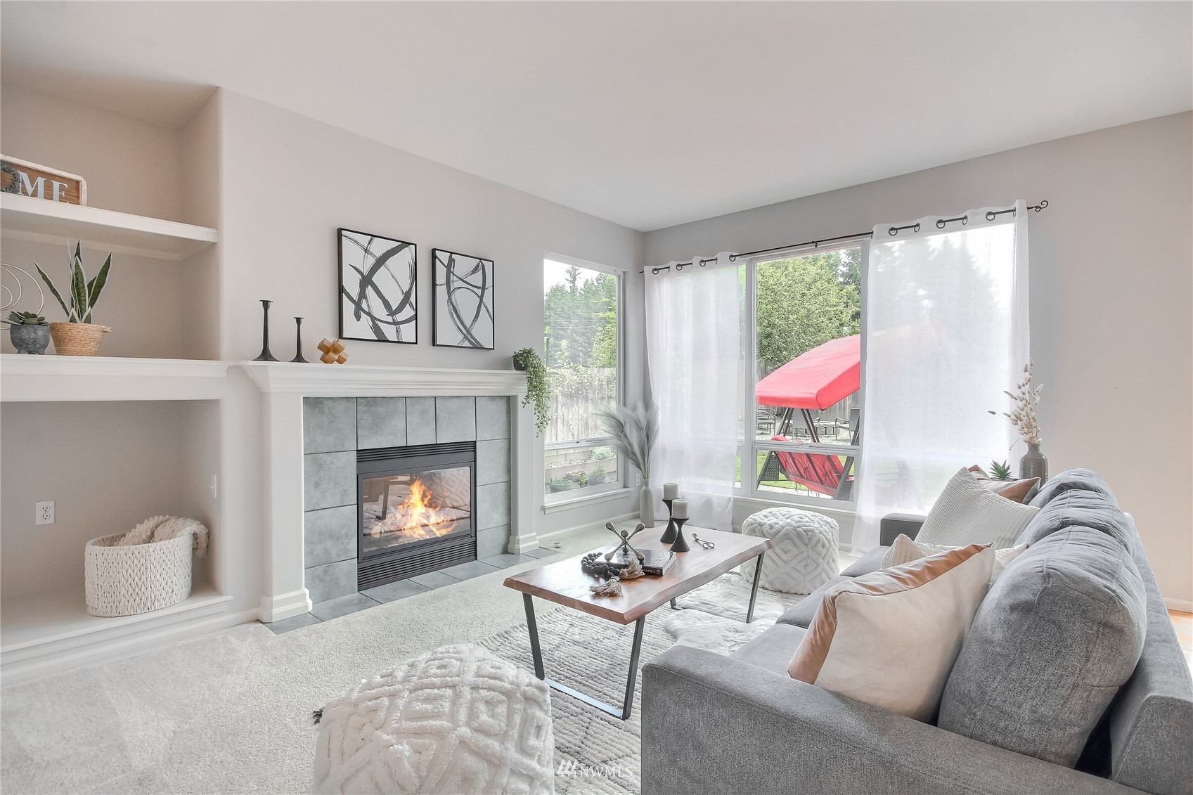 3007 204th Street Southeast Bothell, WA 98012 - Photo 20 of 37 a living room with furniture and a fireplace