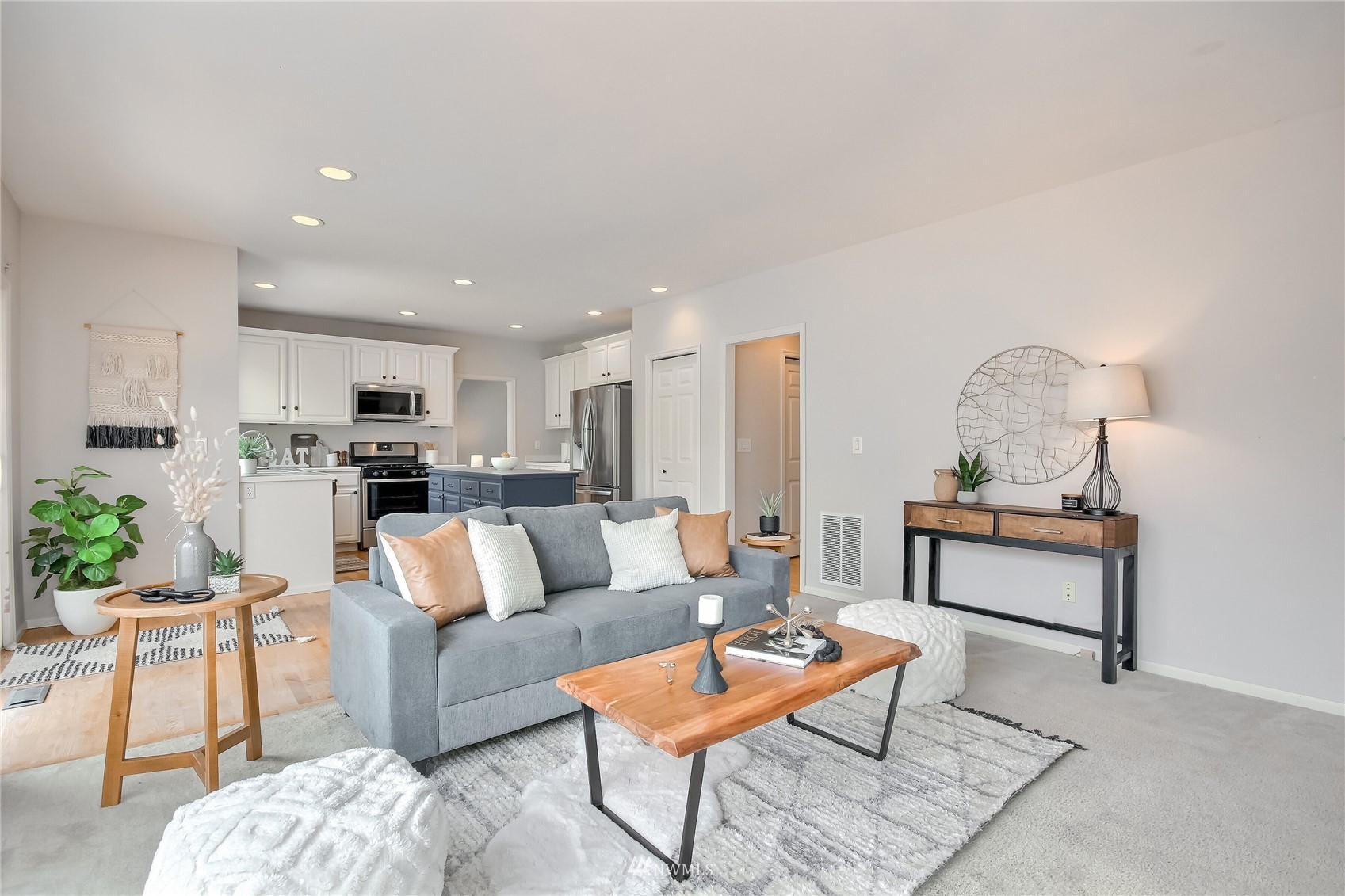 3007 204th Street Southeast Bothell, WA 98012 - Photo 21 of 37 a living room with furniture and kitchen view