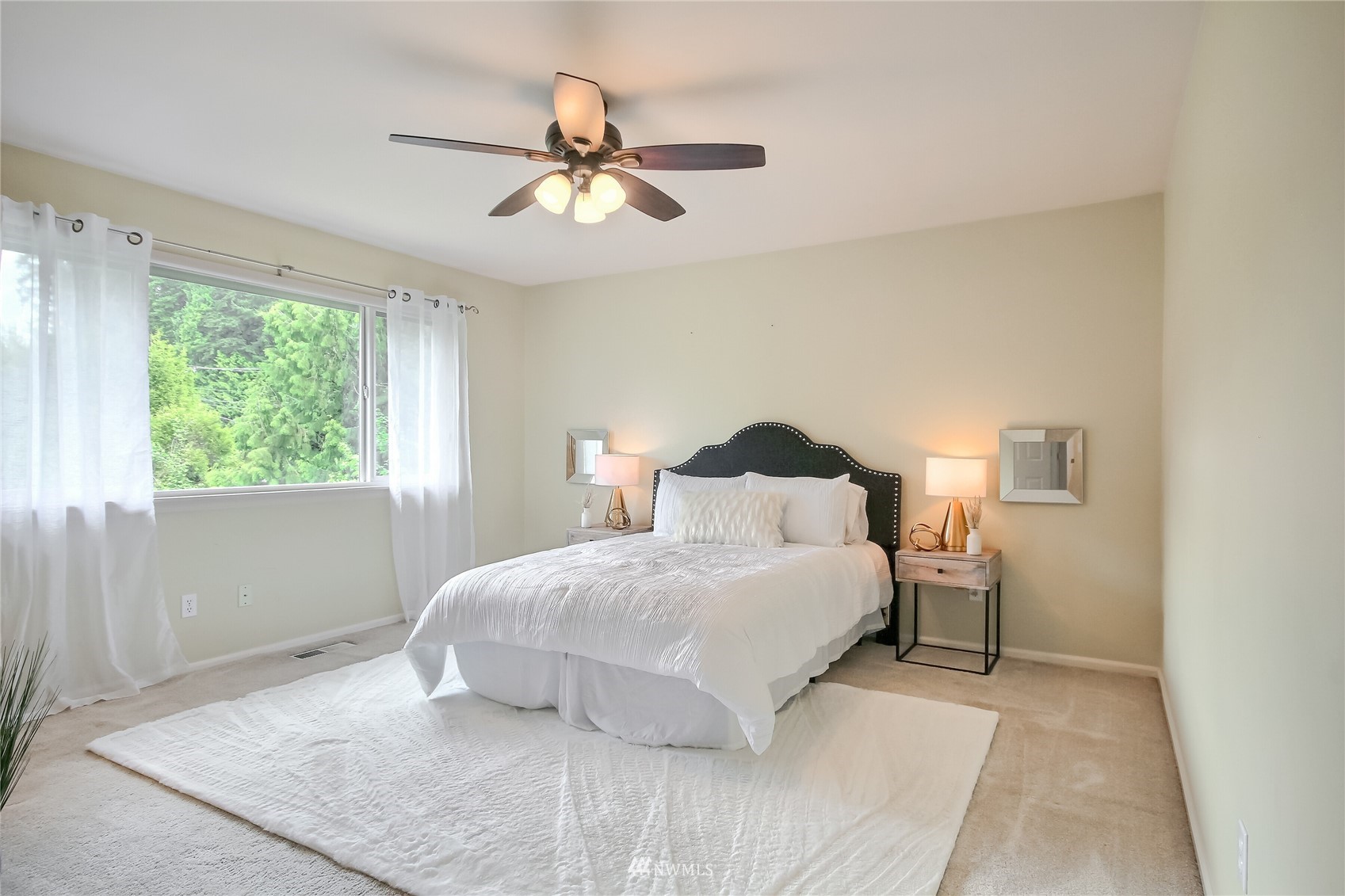3007 204th Street Southeast Bothell, WA 98012 - Photo 22 of 37 a bedroom with a bed and window