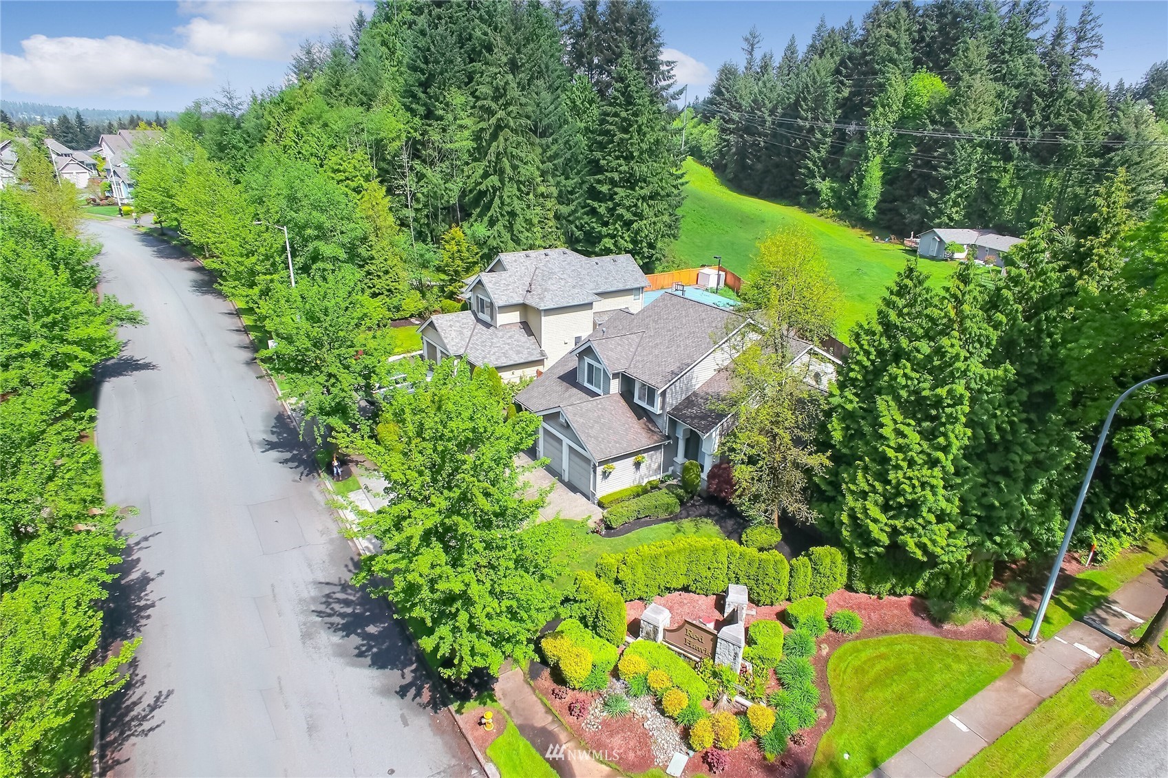 3007 204th Street Southeast Bothell, WA 98012 - Photo 33 of 37 an aerial view of a house with yard swimming pool and outdoor seating