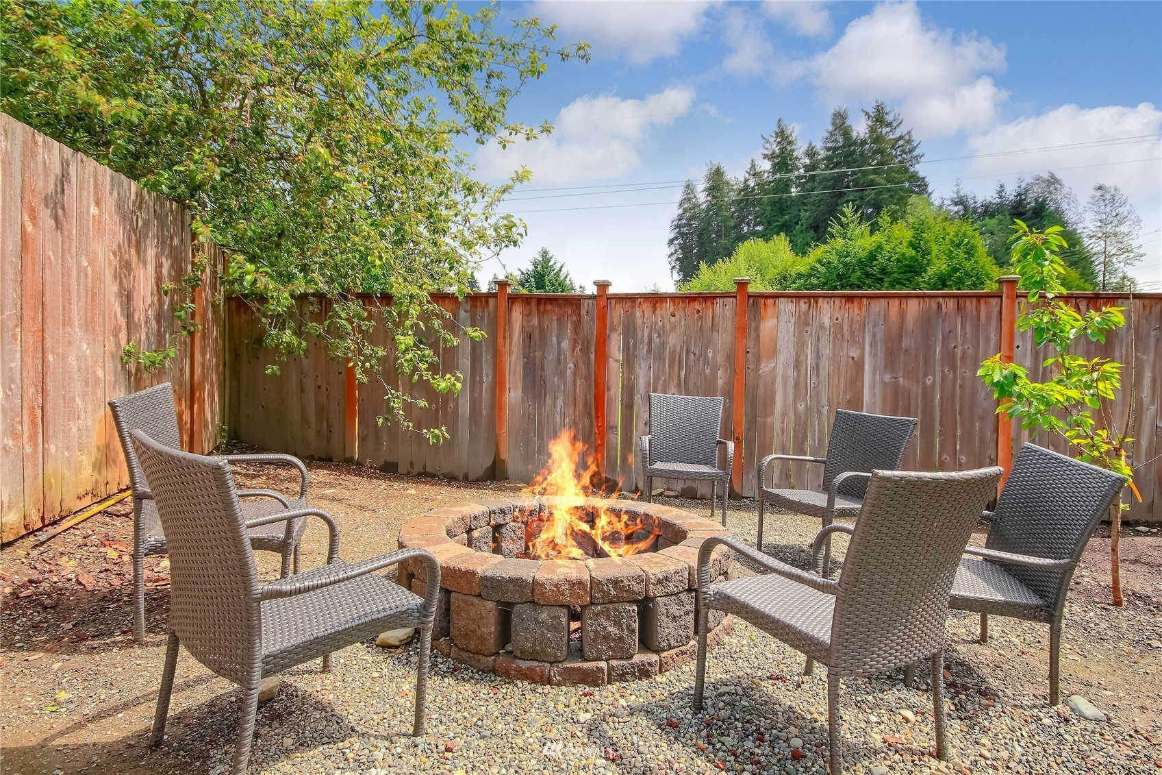 3007 204th Street Southeast Bothell, WA 98012 - Photo 36 of 37 a backyard of a house with table and chairs
