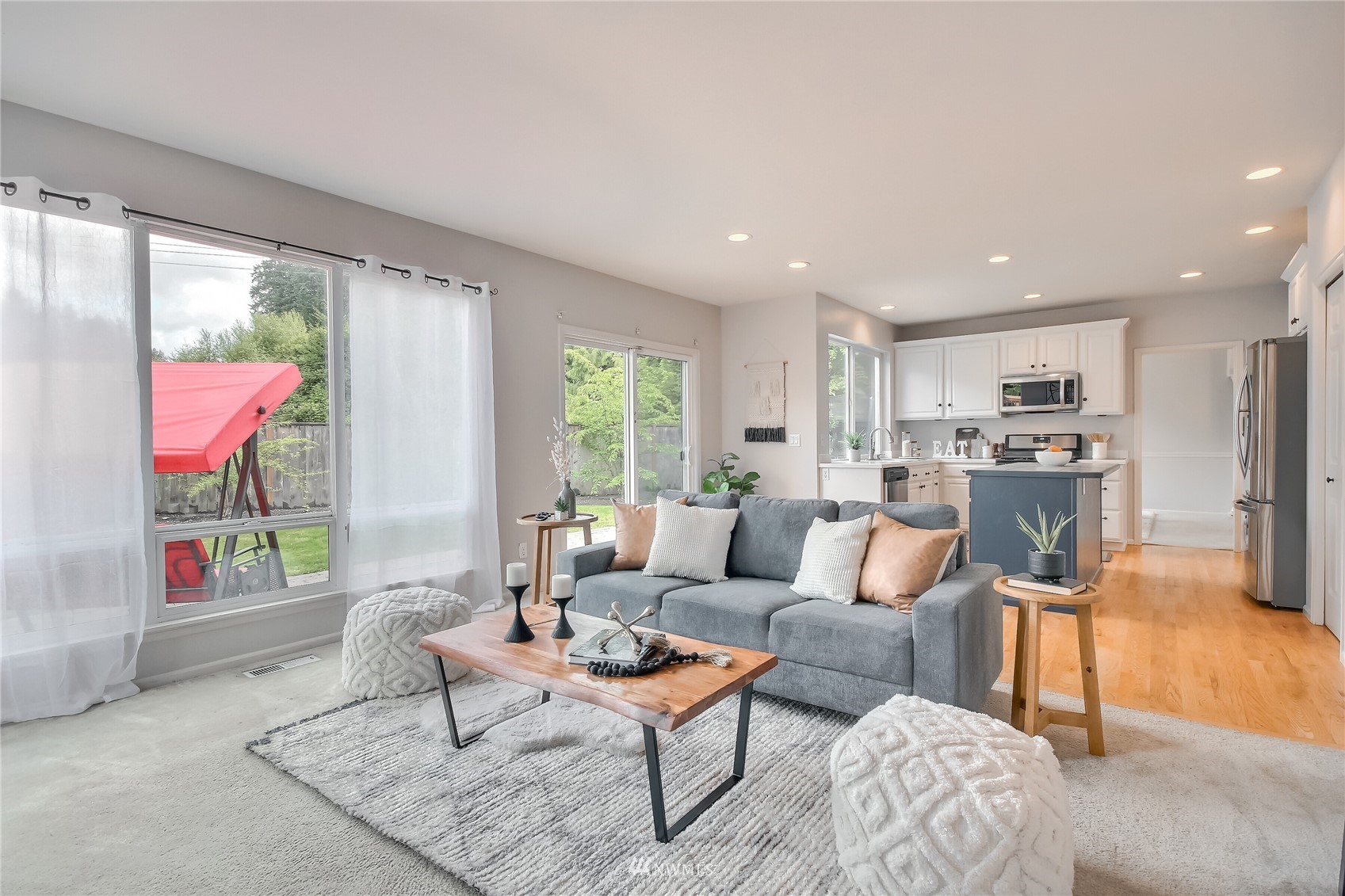 3007 204th Street Southeast Bothell, WA 98012 - Photo 10 of 37 a living room with furniture and a large window