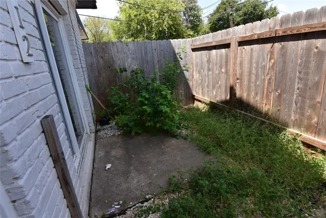 a view of a backyard with plants