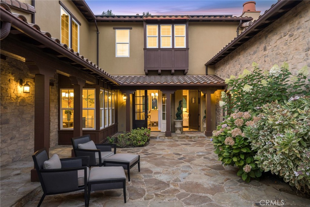 2 Ali Lane Ladera Ranch, CA 92694 - Photo 3 of 75 front courtyard with outdoor fireplace