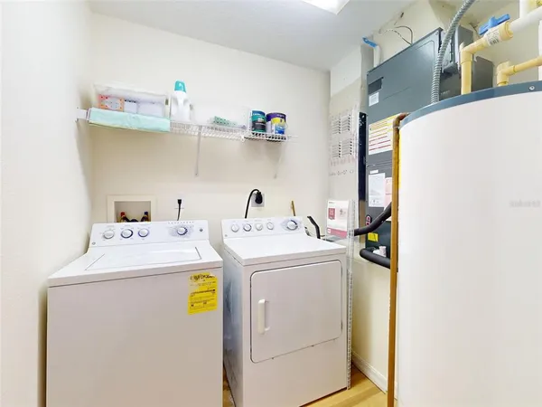a utility room with dryer and washer