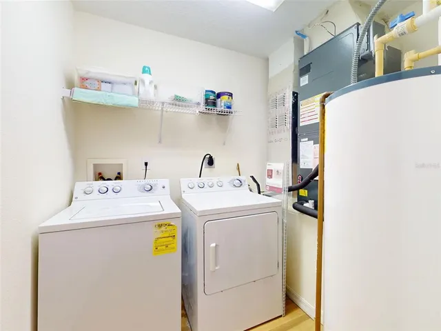 a utility room with dryer and washer