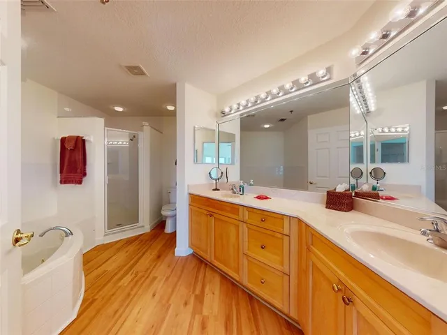 a bathroom with a bathtub and a shower