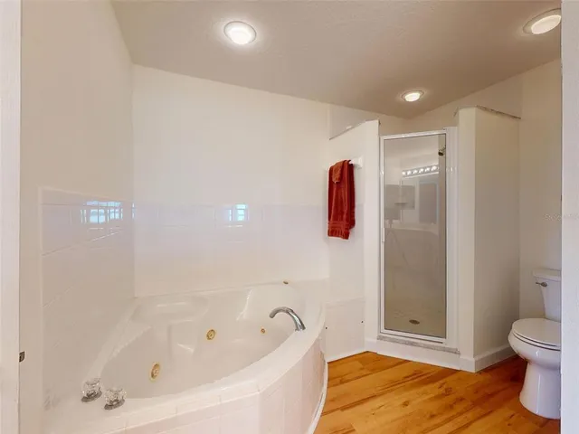 a spacious bathroom with a double vanity sink mirror and